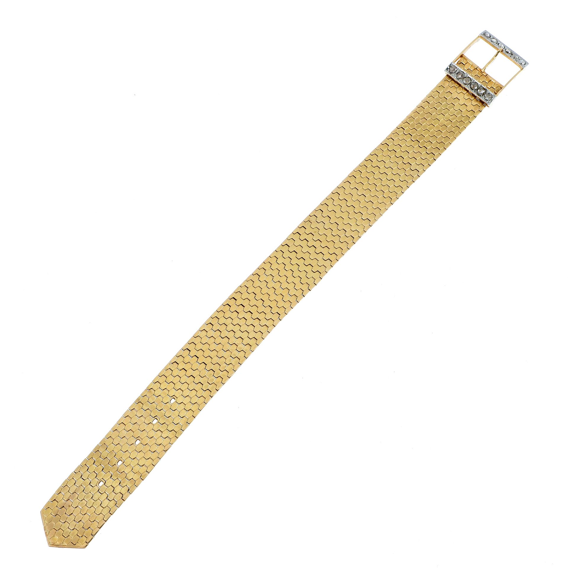 Null 腰带手镯

黄金材质，扣子上有钻石表层装饰。

重量：34.6克（18K - 750）。

一条钻石和18K金手镯。