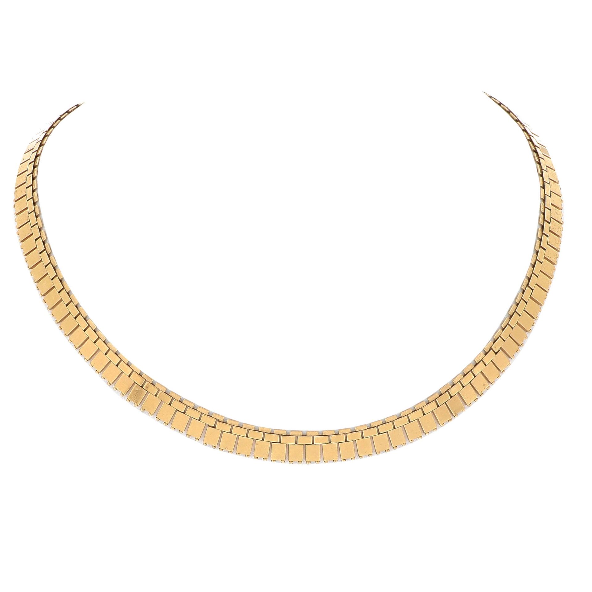 Null COLLIER 

ruban de plaquettes d'or en éventail. 

An 18k gold necklace. 


&hellip;