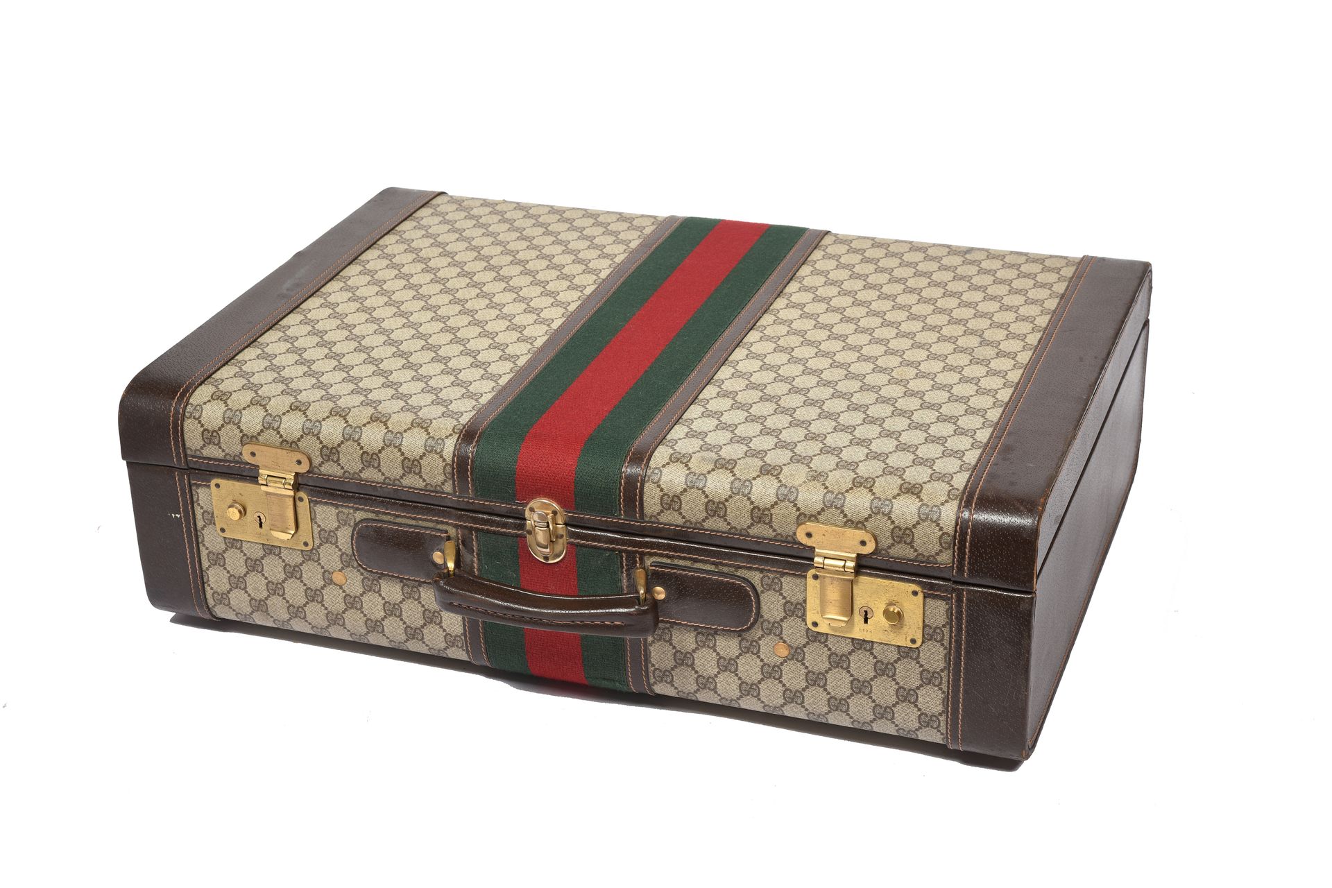 Null GUCCI 

Valise en toile beige monogrammée, cuir marron, garniture en métal &hellip;