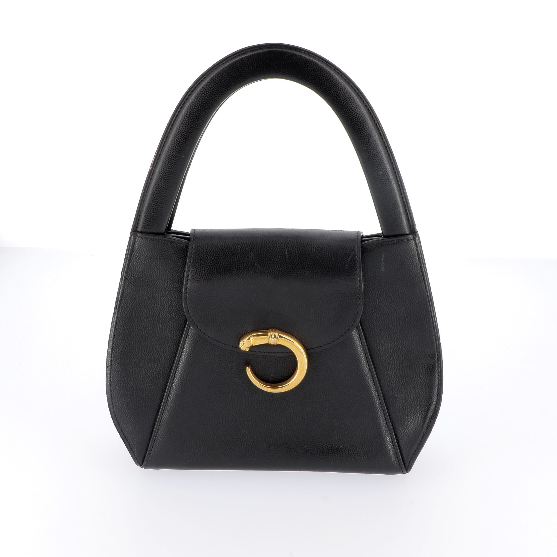 Null CARTIER

19 cm black leather bag, gold metal trim, press stud closure under&hellip;