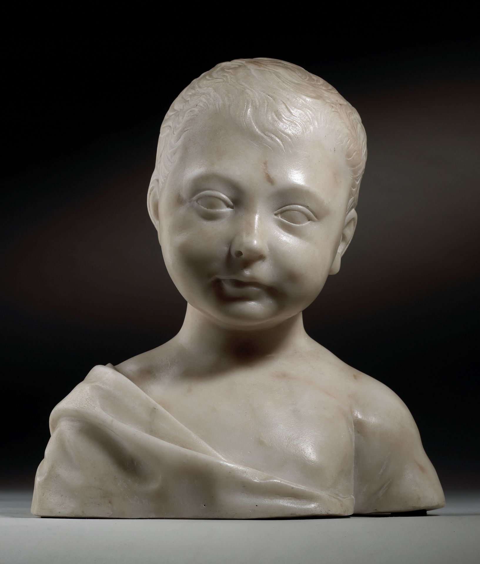 Null DESIDERIO DA SETTIGANO (1428-1464)，圈内人

婴儿基督的半身雕像

意大利，佛罗伦萨，15世纪中期

大理石

25&hellip;