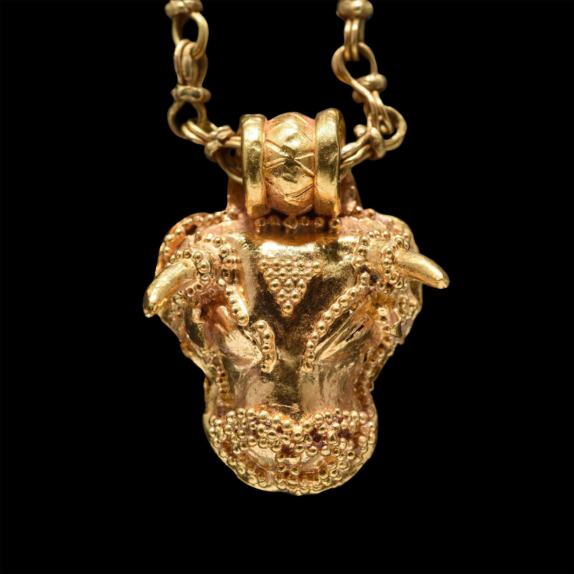 Null BULL'S HEAD PENDANT

Eastern Greece, mid 6th century BC

Gold with granulat&hellip;