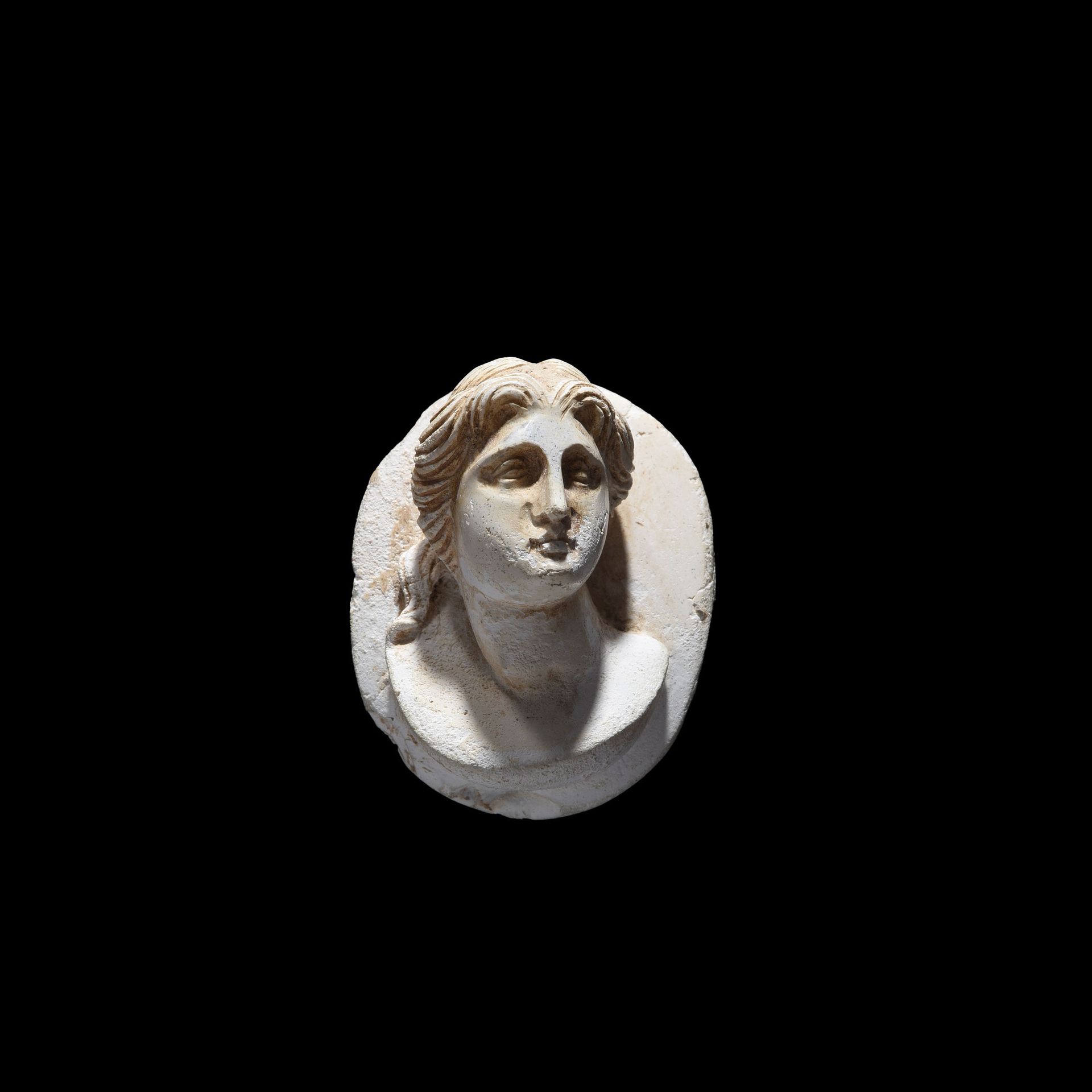 Null CAMEO WITH A FEMALE BUST

Hellenistic art, 1st century BC

A calcified ston&hellip;