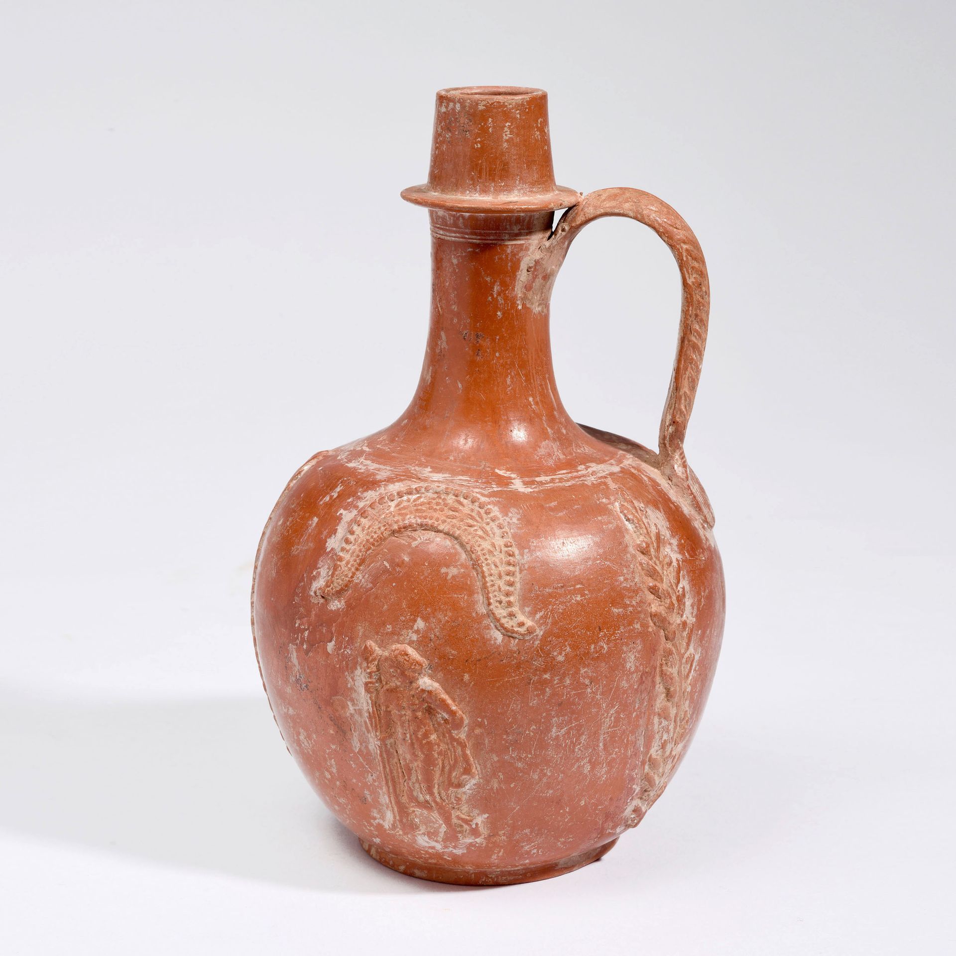 Null GLOBULAR SIGILATED AMPHORA

North Africa, 2nd century

Orange terra-cotta w&hellip;