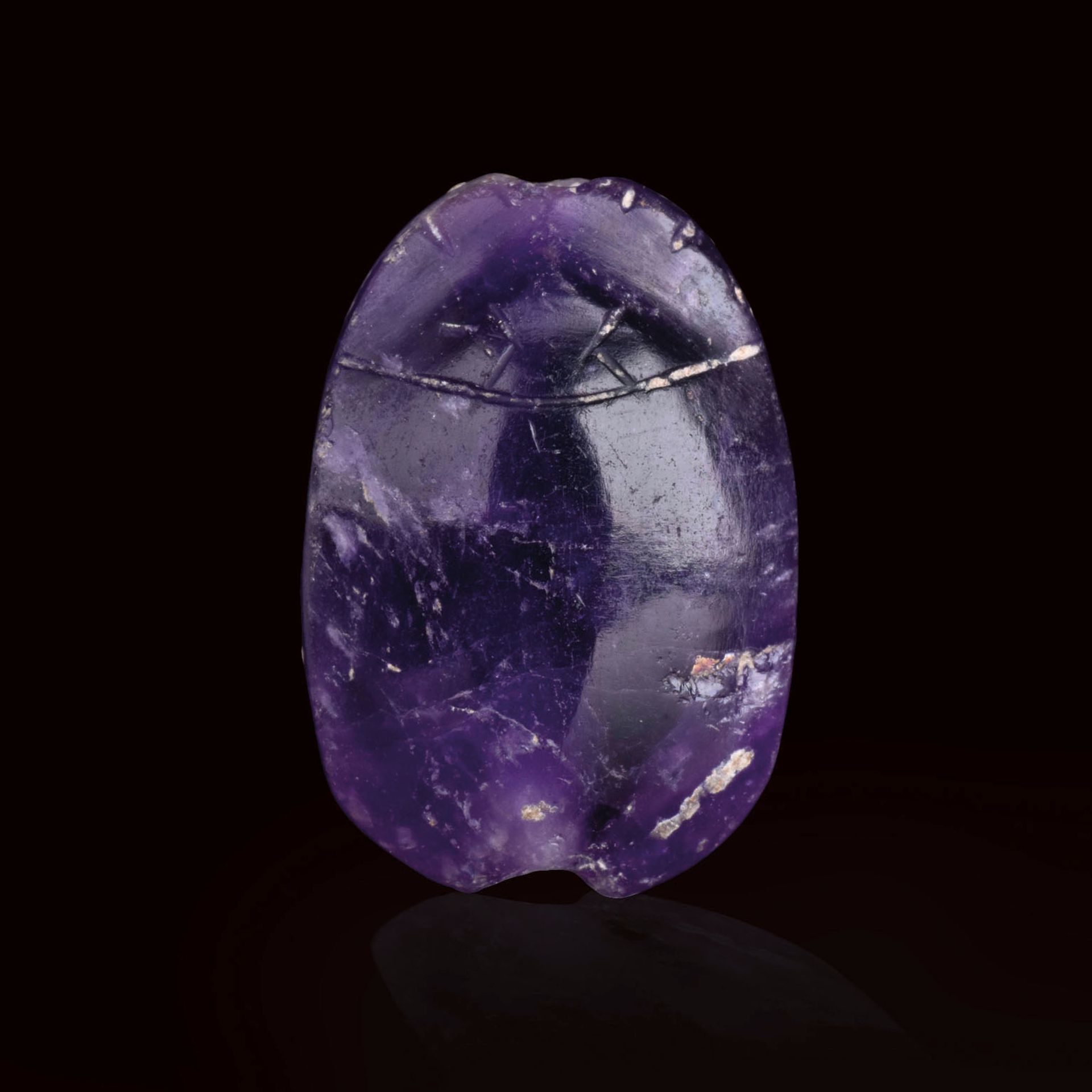 Null ǞǞǞ

埃及，罗马时期，约公元前1世纪

紫水晶，风格化的雕刻

H.21毫米；3.10克



出处

前英国收藏品，1990年代在艺术市场上获得&hellip;