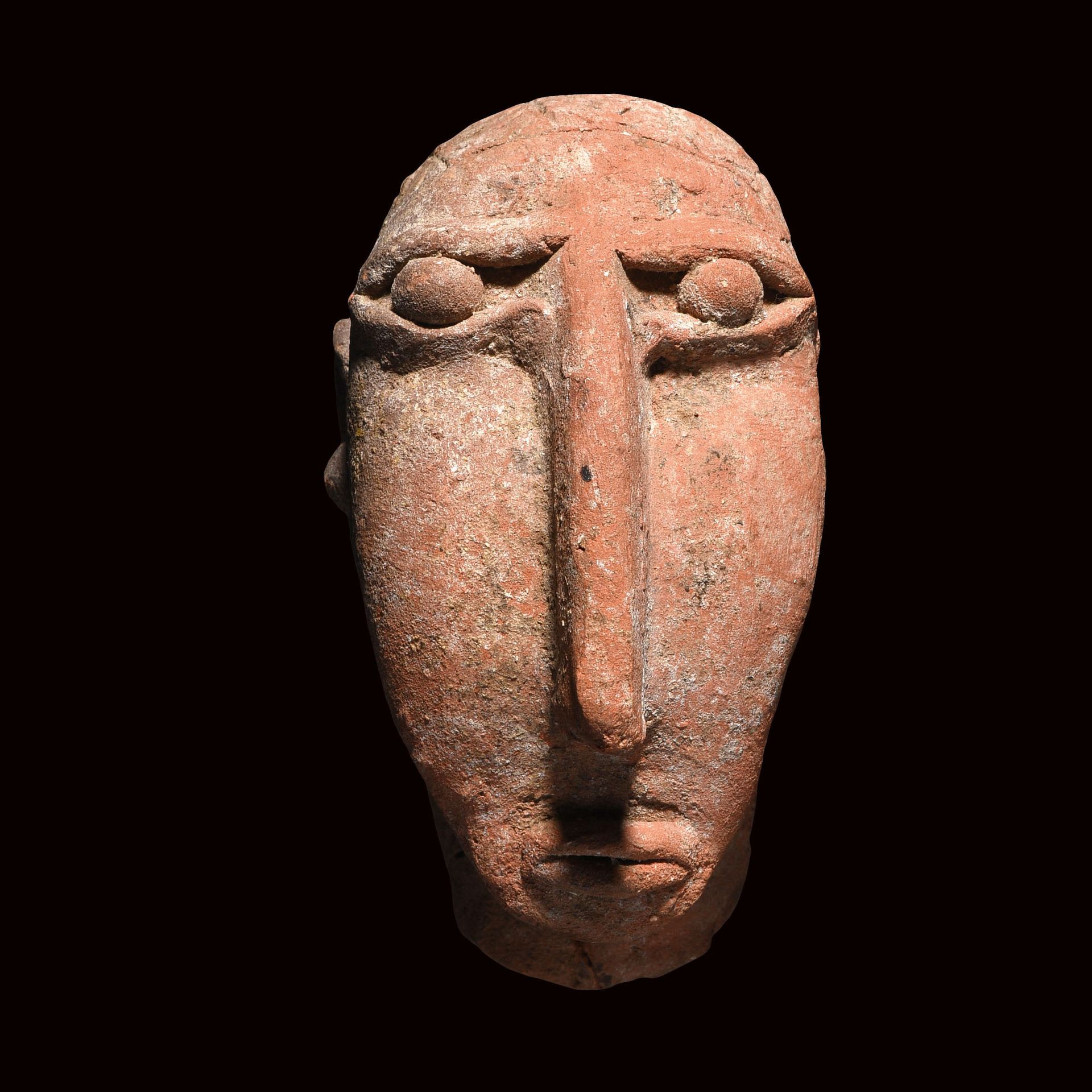 Null 法拉沙头

埃塞俄比亚，阿克苏姆，5-7世纪

橙色赤土

H.10厘米



出处

法国私人收藏



模特的脸部特征是非常修长的形状和非常凸起的&hellip;