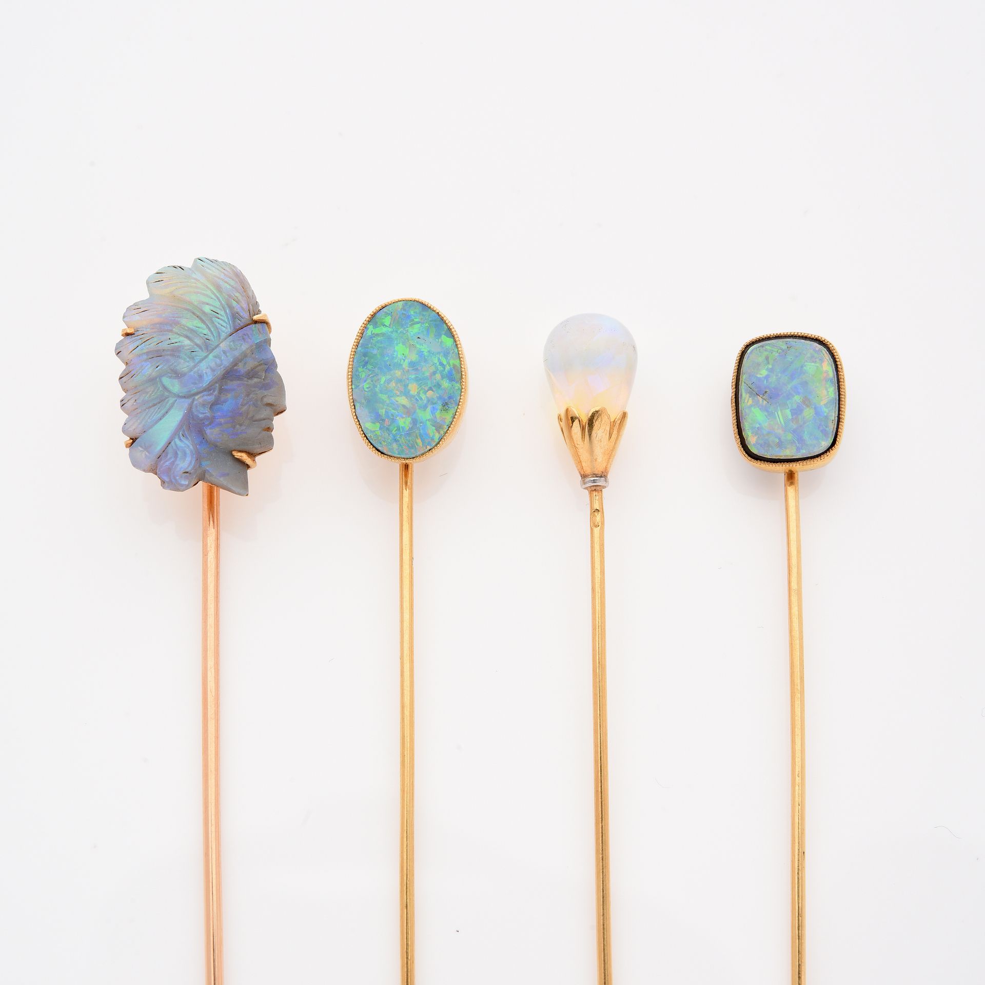 Null SET OF 4 TIE PINS :

- One in head of Indian chief of carved opal and yello&hellip;