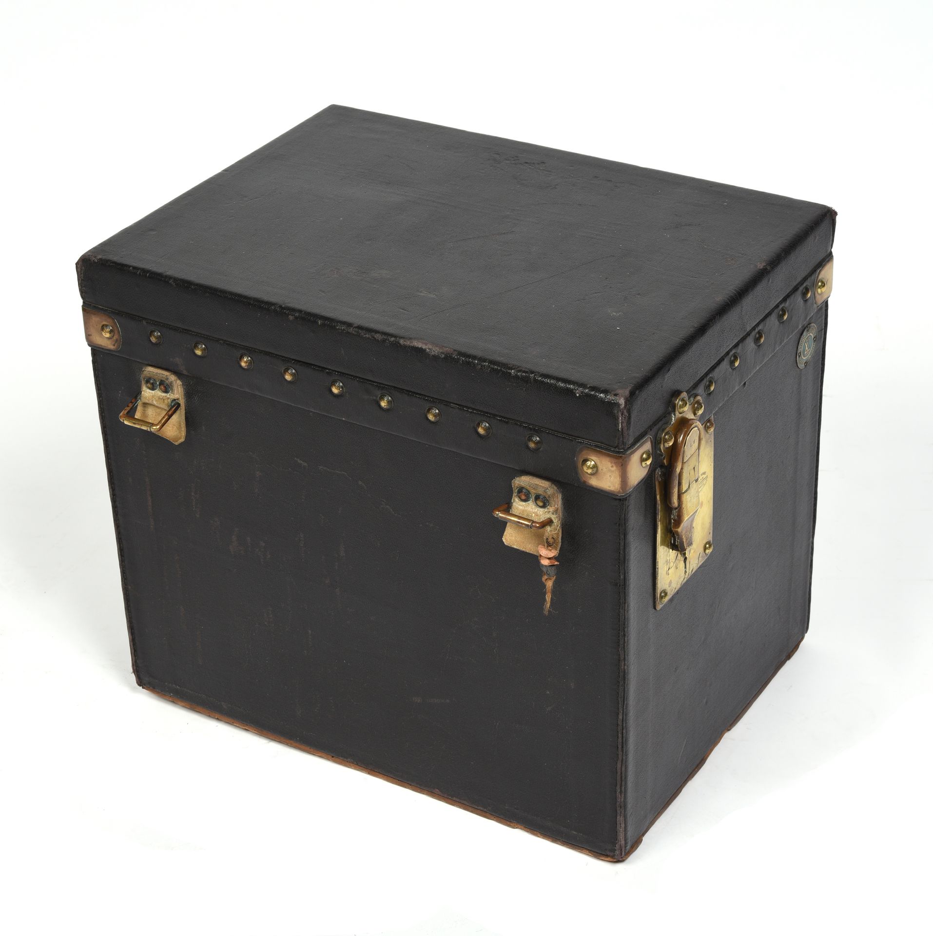 LOUIS VUITTON Small trunk in black coated canvas, gilde…