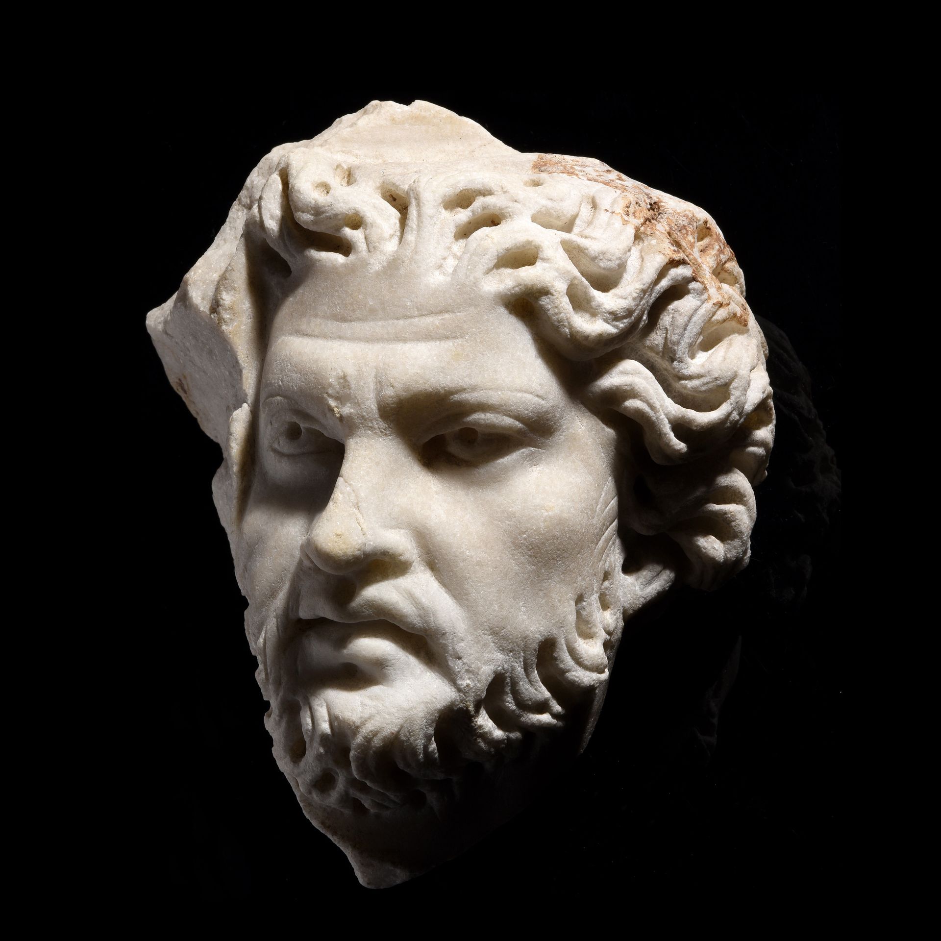 Null FRAGMENT OF A SARCOPHAGUS SHOWING

A BARBARIAN'S HEAD

White marble; restor&hellip;