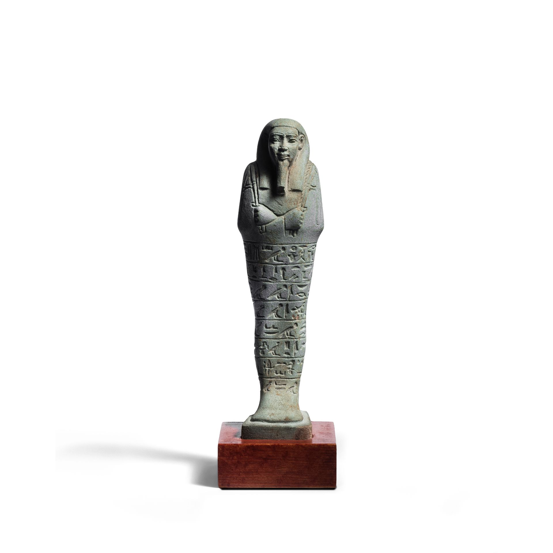 Null *USHABTI
Fayence
H. 16 cm
Ägypten, Spätzeit, 664-332 v. Chr. 

Herkunft
Ehe&hellip;