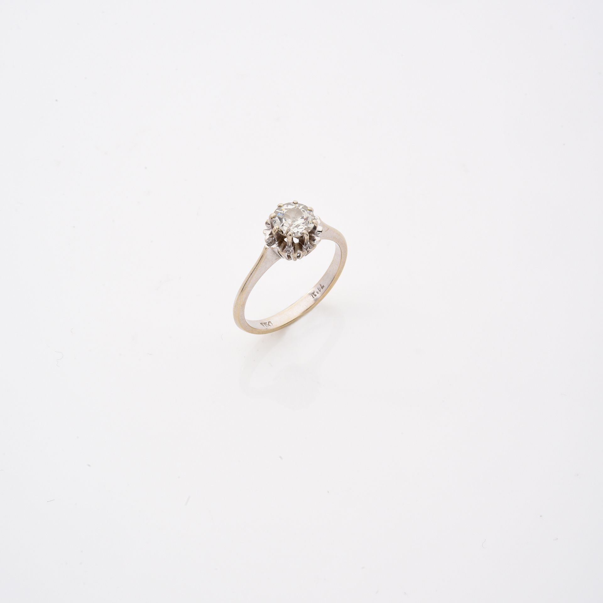 Null BAGUE SOLITAIRE
en or gris, sertie d'un diamant demi taille pesant environ &hellip;