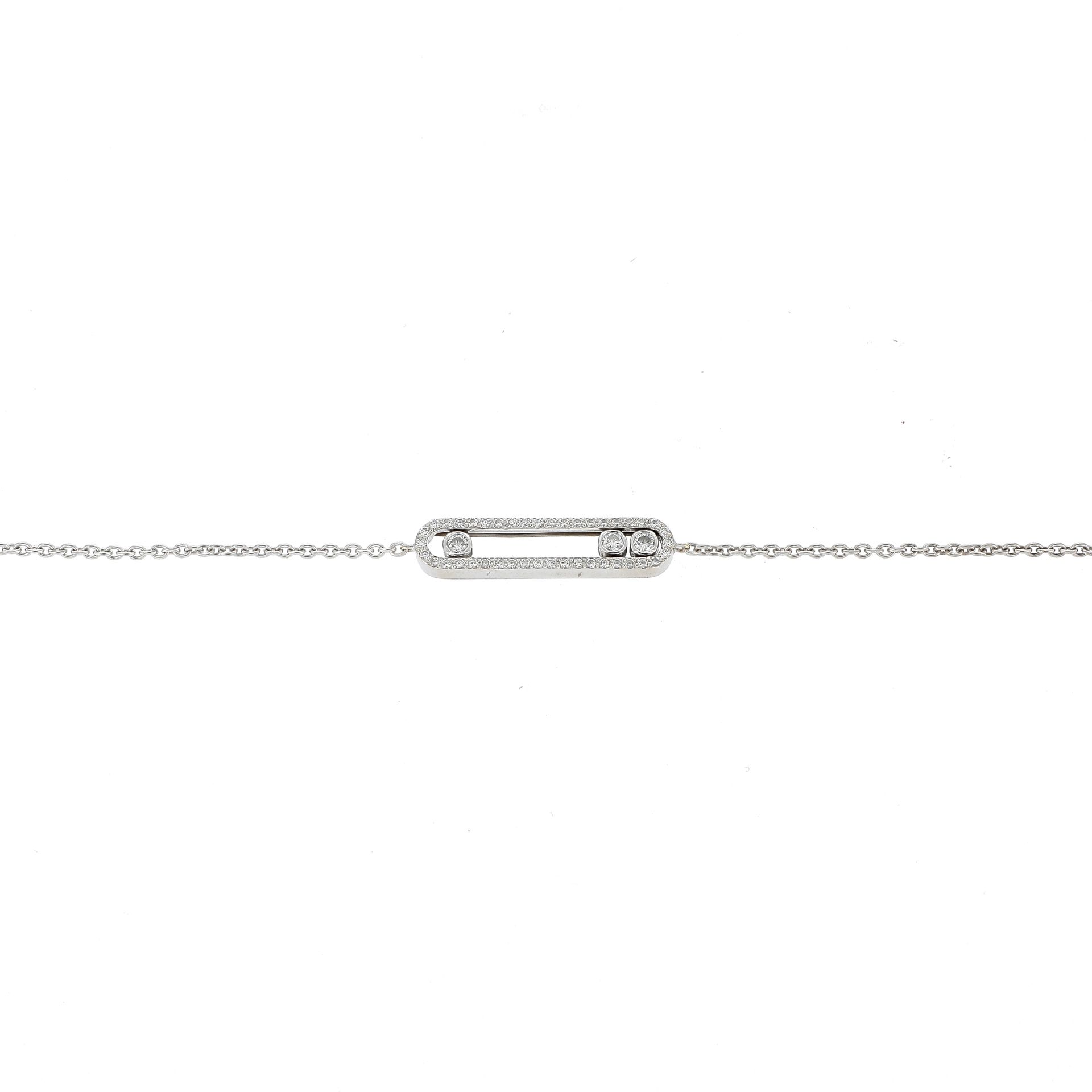 Null FIN BRACELET
en chaîne d'or gris, centré d'un ovale ajouré serti de diamant&hellip;
