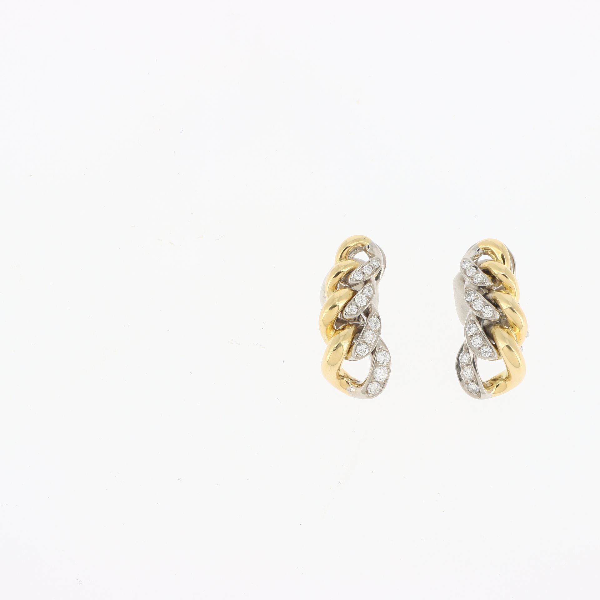 Null PAIR OF EAR CLIPS GOURMETTE
in two shades of gold, half paved with diamonds&hellip;