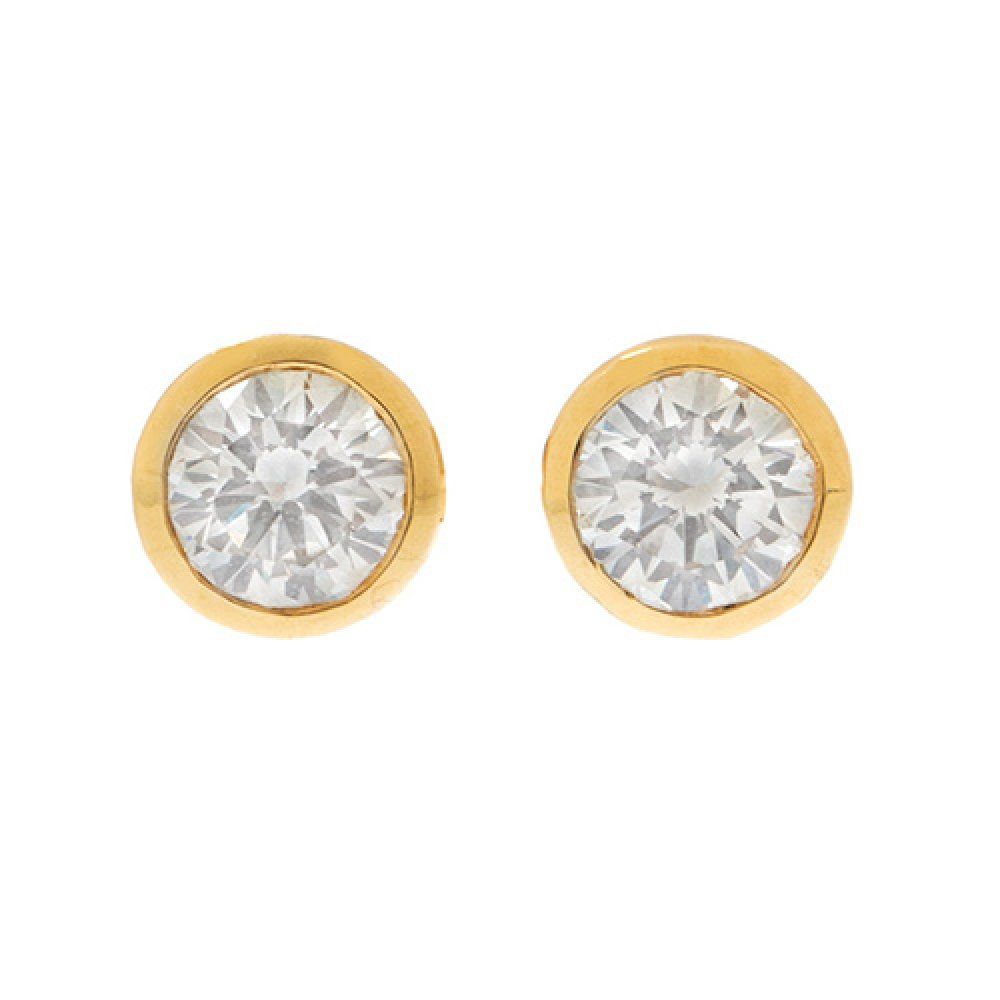 Pair of 18k yellow gold earrings. With central diamonds total weight ca. 0.75 ct&hellip;
