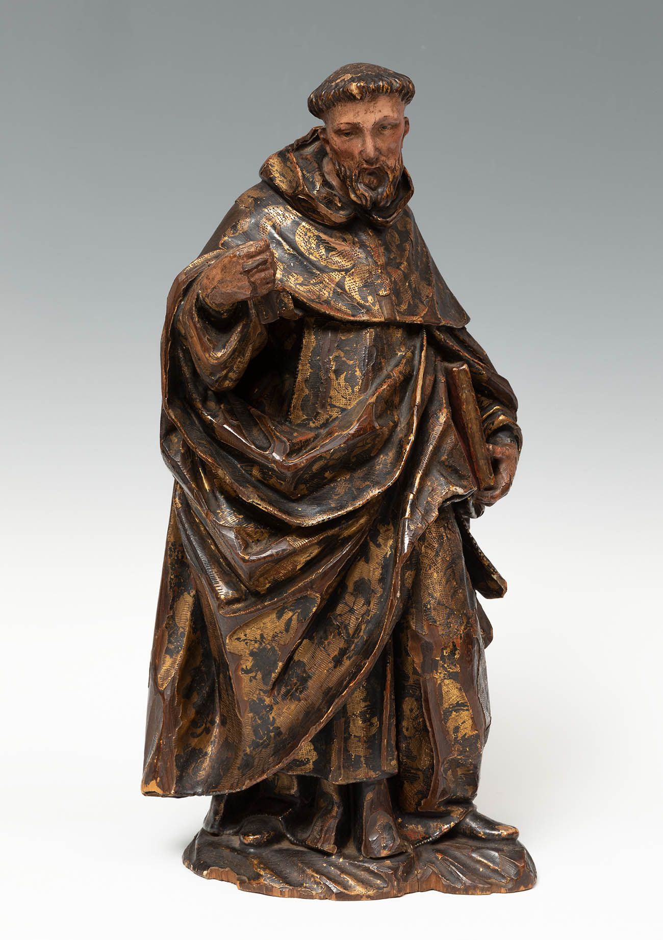 Null 安达卢西亚画派；17世纪上半叶。
"十字架上的圣约翰"。
雕刻和多色木。
它在面板上有轻微的缺陷，并丢失了多色漆。
尺寸。22 x 17厘米。
这座雕&hellip;