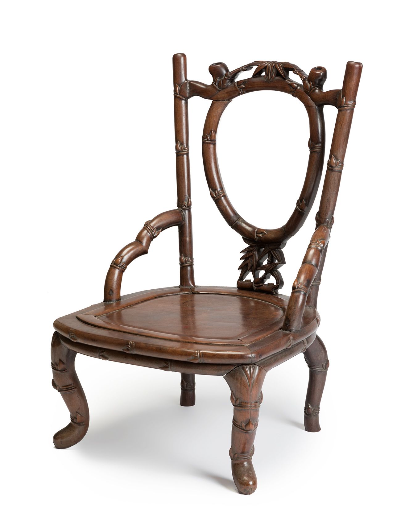 Null Rare and unusual low armchair. China, late Qing dynasty, 19th century.
Carv&hellip;