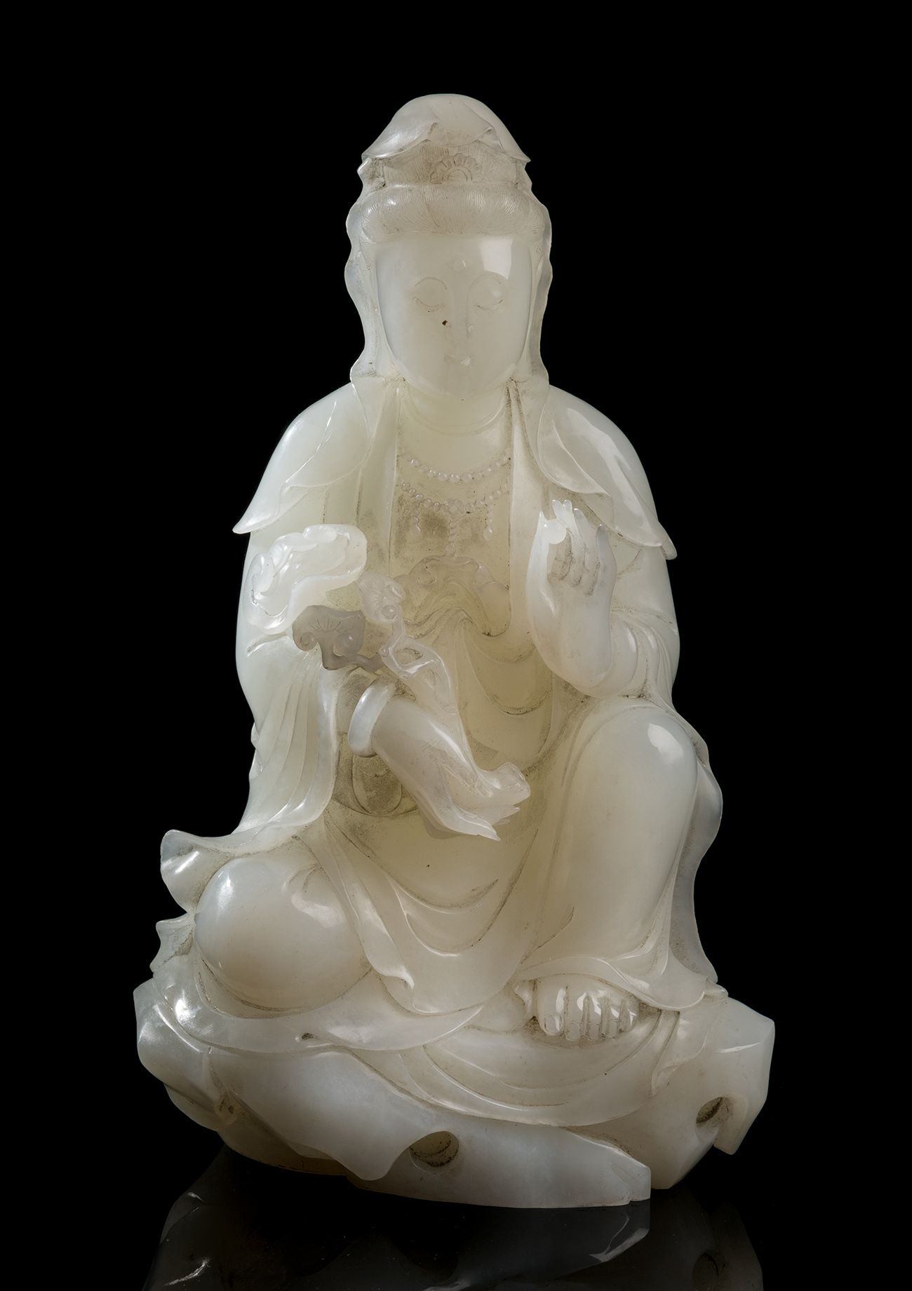 Null Guanyin; China, Quing Dynasty, 1644-1911.
Carved white jade.
Measurements: &hellip;