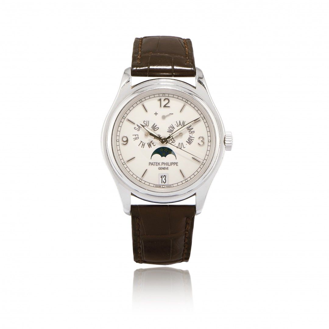 Null PATEK PHILIPPE IN WHITE GOLD ANNUAL CALENDAR REF. 5146 WITH BOX AND PAPERS,&hellip;