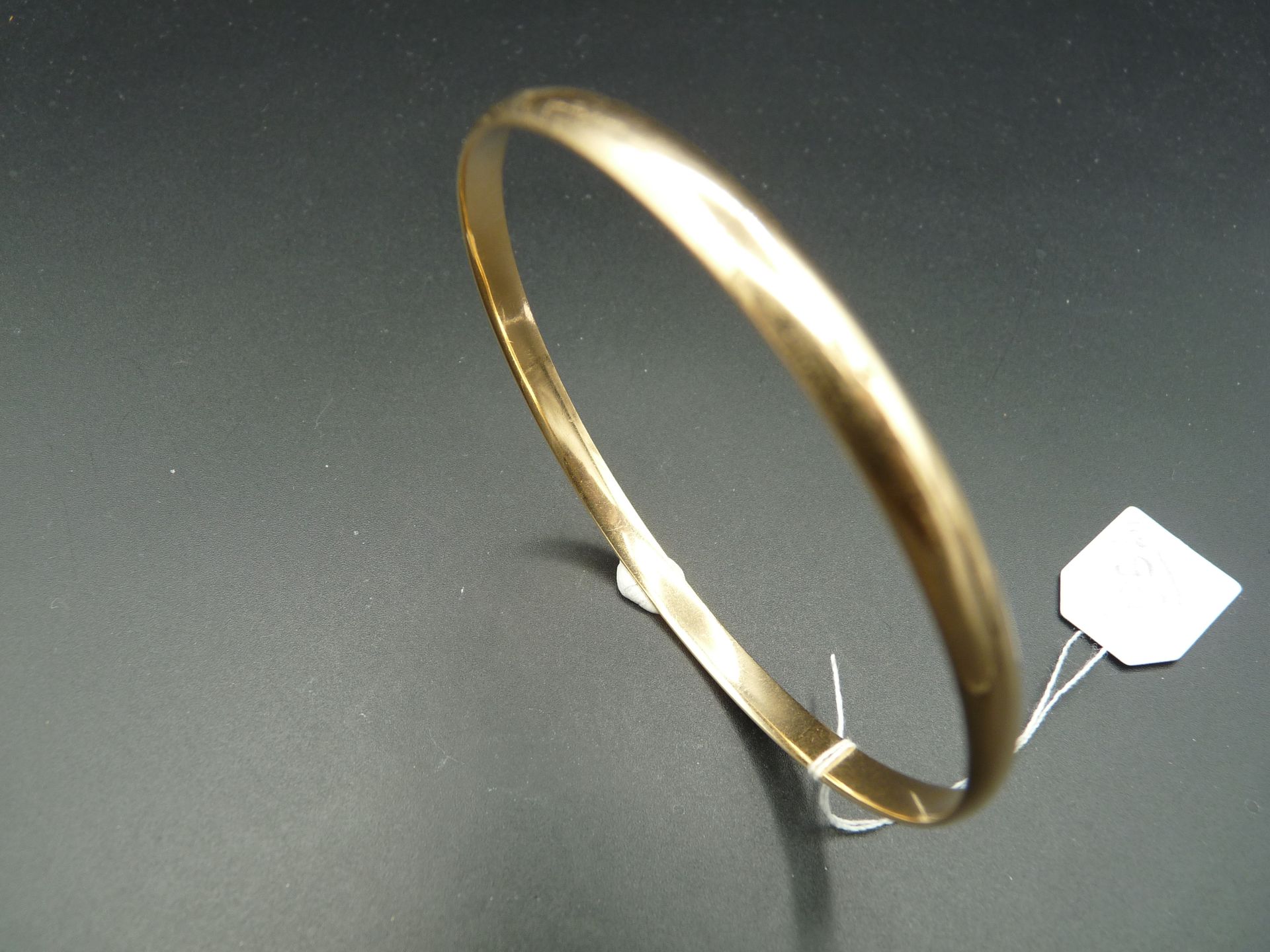 Null Bracelet jonc rigide fermé en or jaune 18K (750/oo) lisse. Diamètre intérie&hellip;