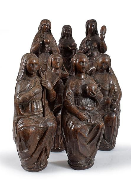 Null A set of seven walnut sculptures

representing the Tree Theological Virtues&hellip;