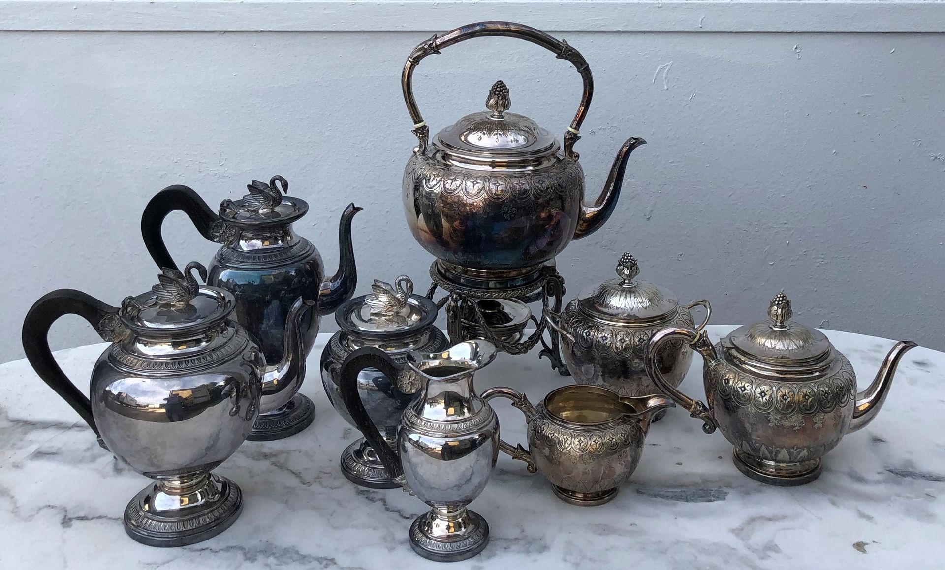 Null Two silver plated tea and coffee sets, one in the Empire style, each includ&hellip;