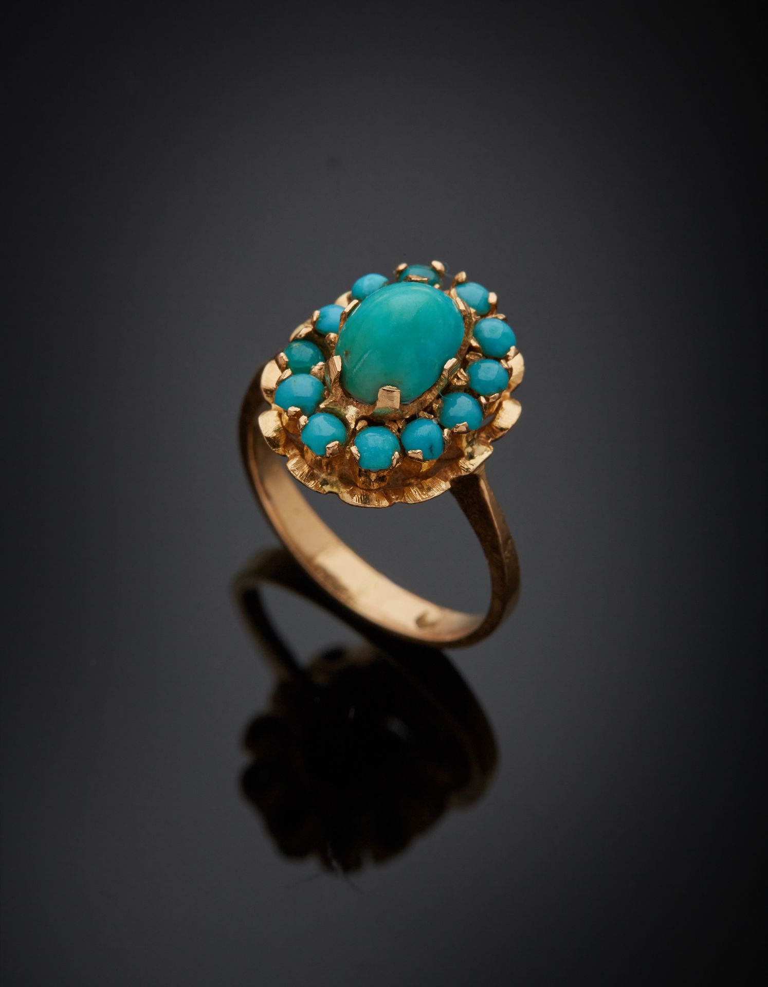 Null 18K yellow gold 750‰ surround ring, set with cabochon-cut turquoise. Irania&hellip;
