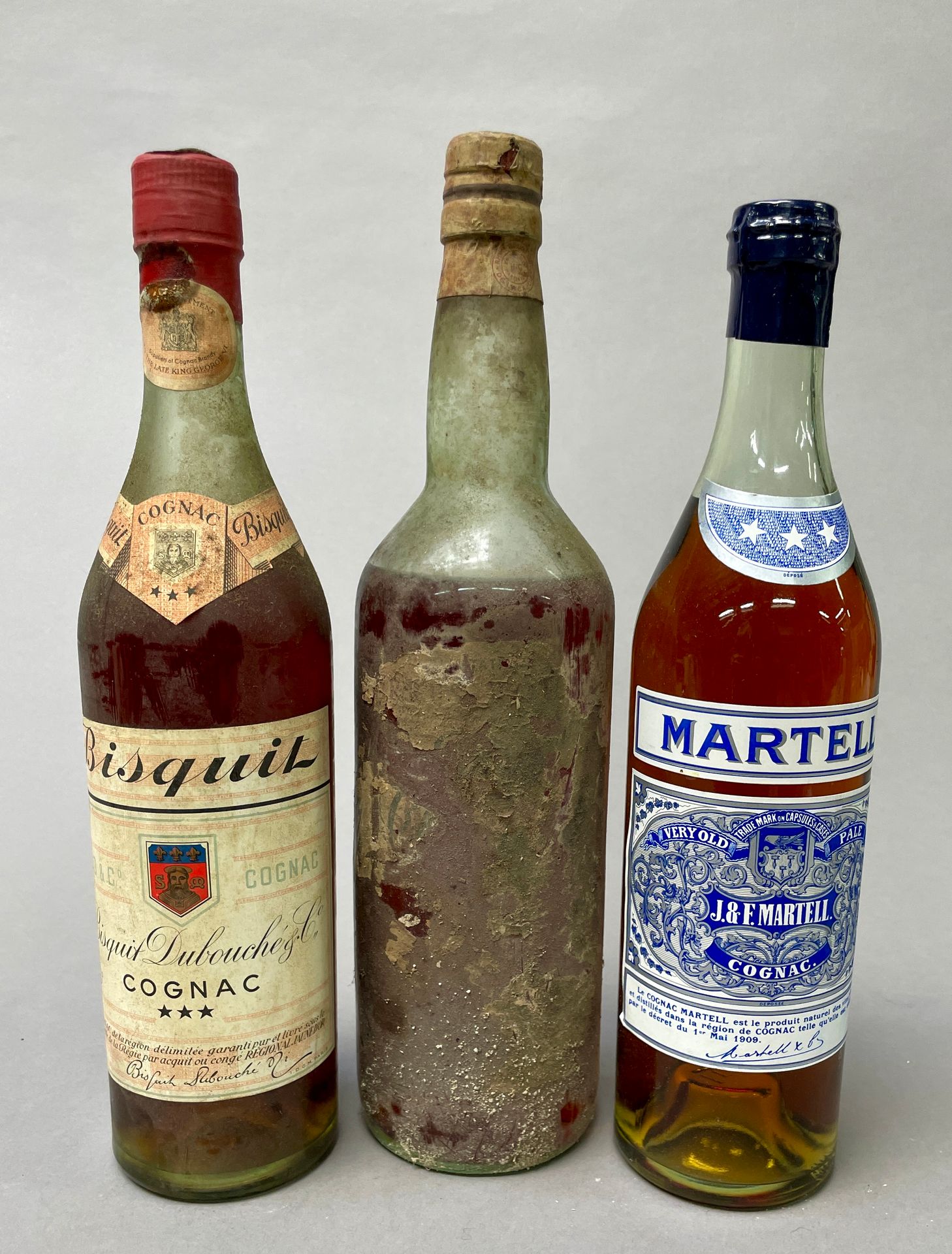 Null 3 bouteilles :
Cognac MARTELL, Cognac Bisquit Dubouché, Rhum CLEMENT
En l'é&hellip;