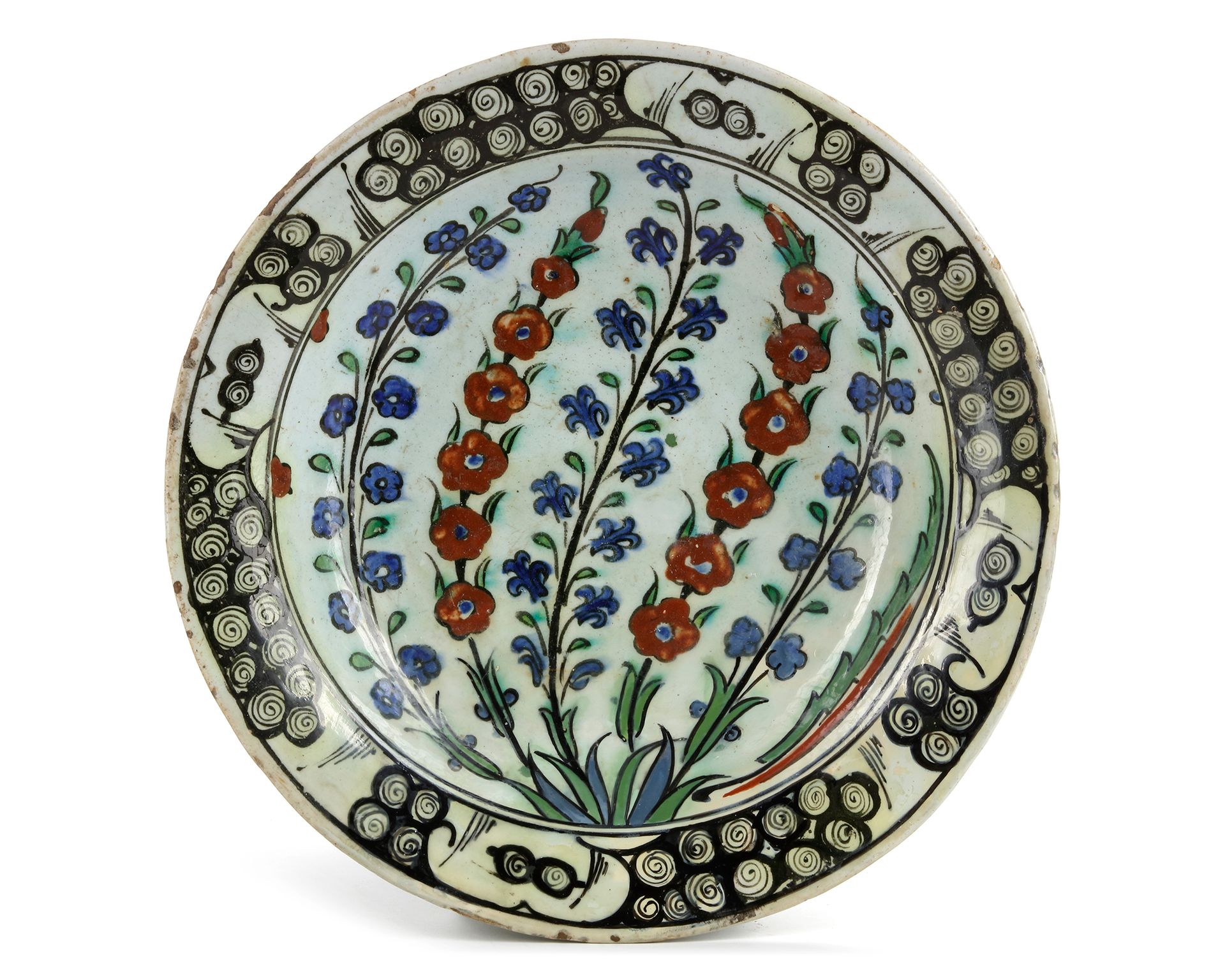AN IZNIK POTTERY DISH, TURKEY, 17TH CENTURY With sloping rim, underglaze, decora&hellip;