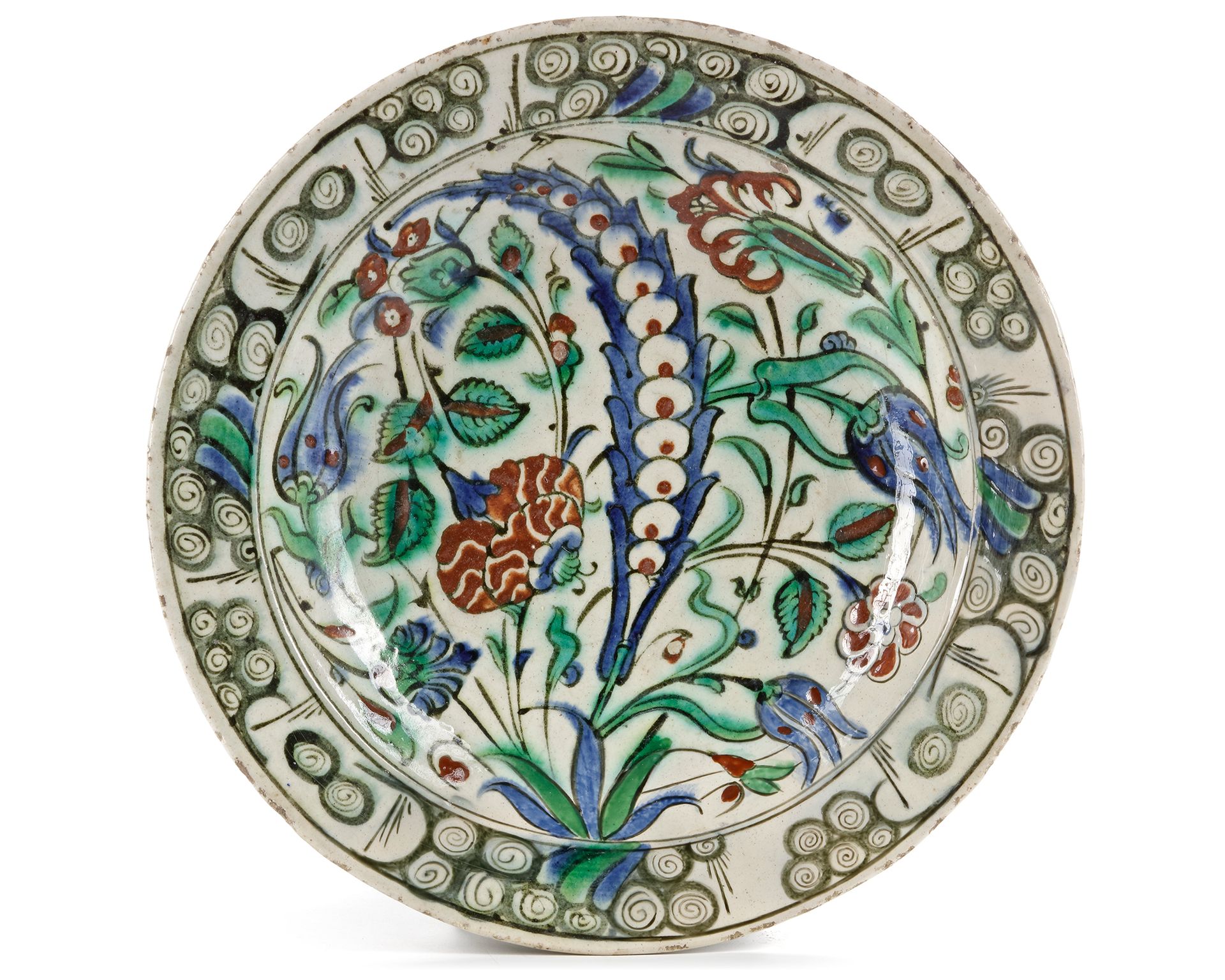 AN IZNIK POTTERY DISH WITH QUATRE FLEURS DECORATION, OTTOMAN TURKEY, 16TH CENTUR&hellip;