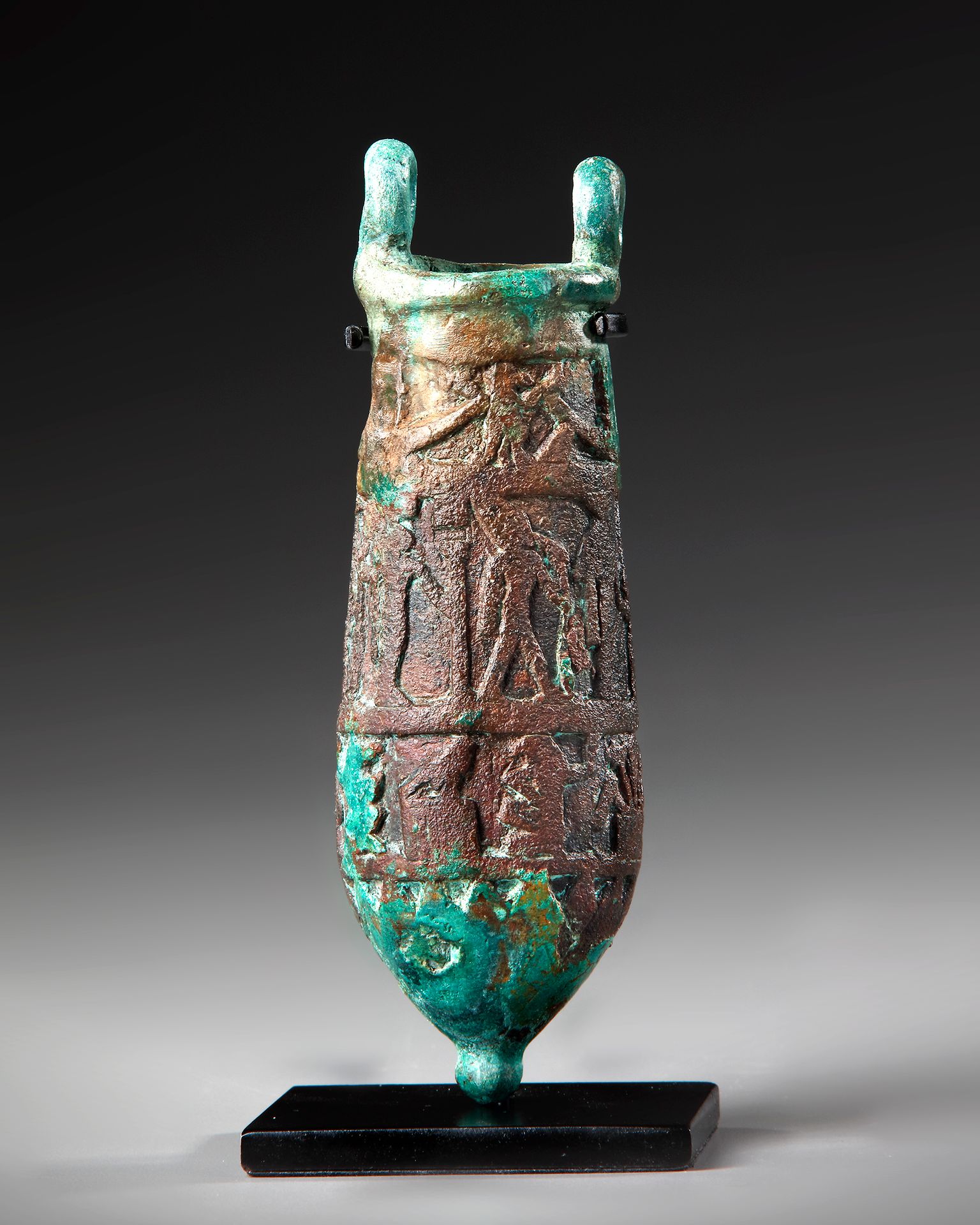 AN EGYPTIAN BRONZE SITULA, PTOLEMAIC PERIOD, CIRCA 304-30 B.C. With two distinct&hellip;