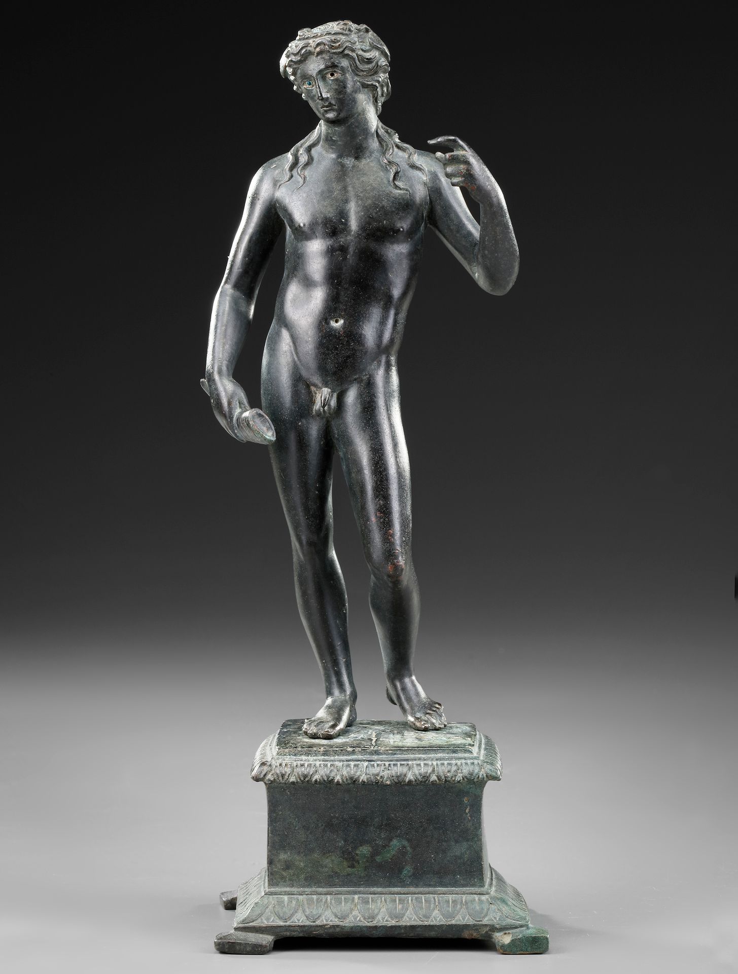 A ROMAN BRONZE STATUETTE OF APOLLO CARNEUS, CIRCA 1ST-2ND CENTURY A.D. An elegan&hellip;