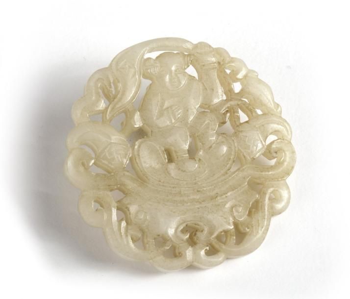 A Chinese pale celadon jade openwork plaque The plaque is carved and pierced wit&hellip;