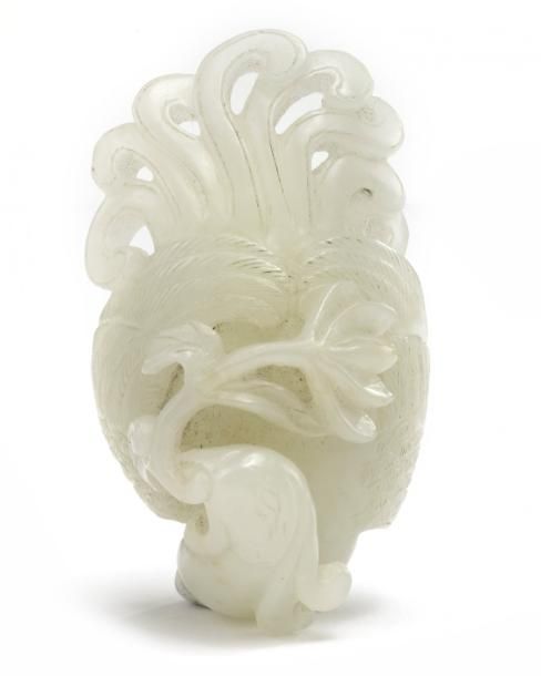 A Chinese pale celadon jade carving of a phoenix The phoenix is carved with its &hellip;