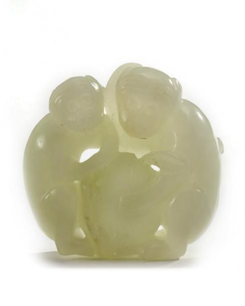 A Chinese white jade 'monkey and peach' group The carving is carved and pierced &hellip;