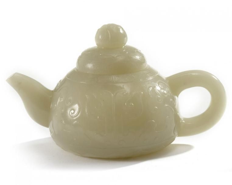 A Chinese pale celadon jade teapot and cover The teapot is decorated with a c-sh&hellip;