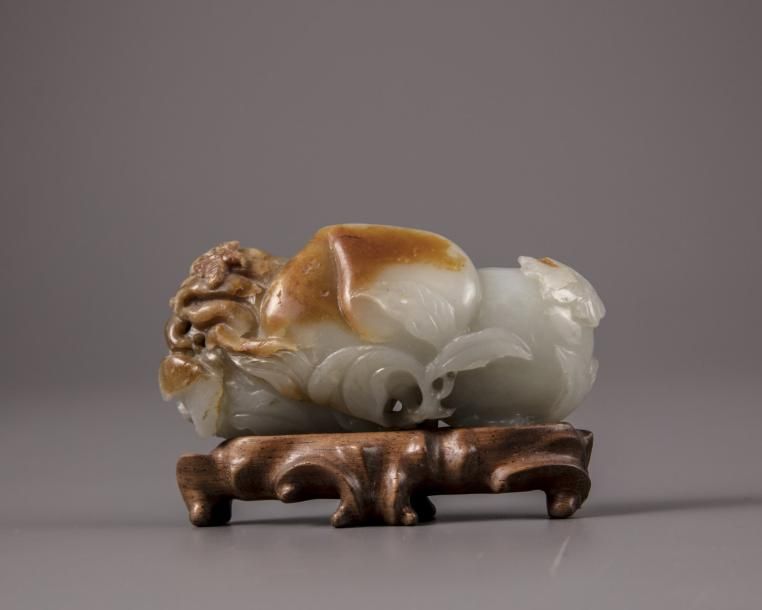 A Chinese white and russet jade 'Three Abundances' carving The piece is carved a&hellip;