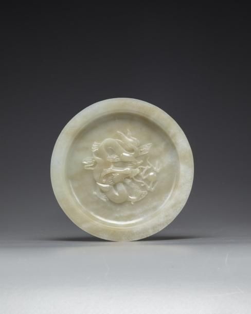 A Chinese pale celadon jade 'dragon' dish The dish is carved to the centre in hi&hellip;