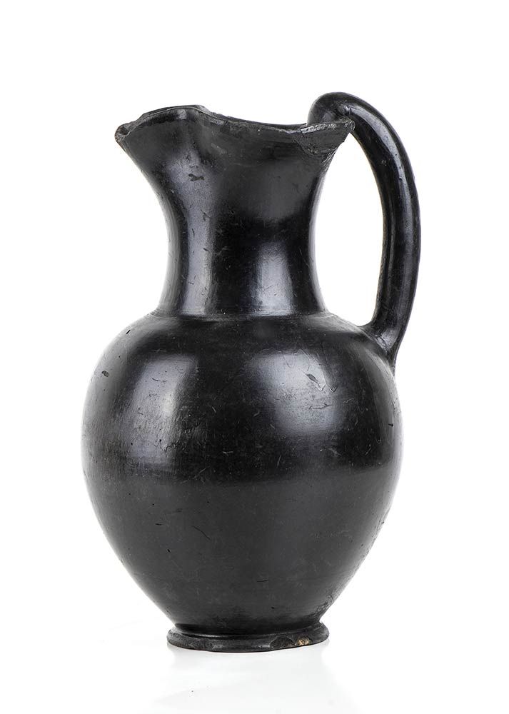 Null OINOCHOE ETRUSCA IN BUCCHERO
VII - VI secolo a.C.
Alt. Cm 26,5

Integro ; s&hellip;