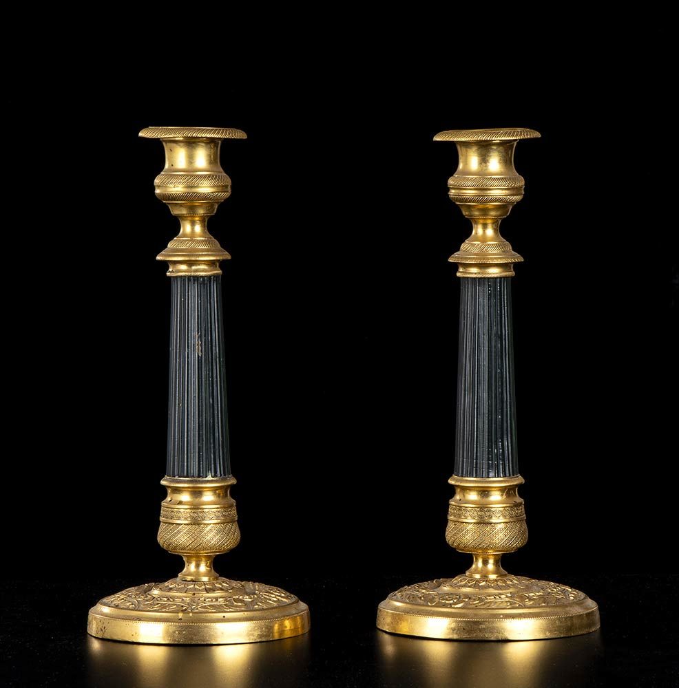 Null EMPIRE STYLE

Pair of candlestick
Golden and painted metal, h 27 cm 
Pair o&hellip;