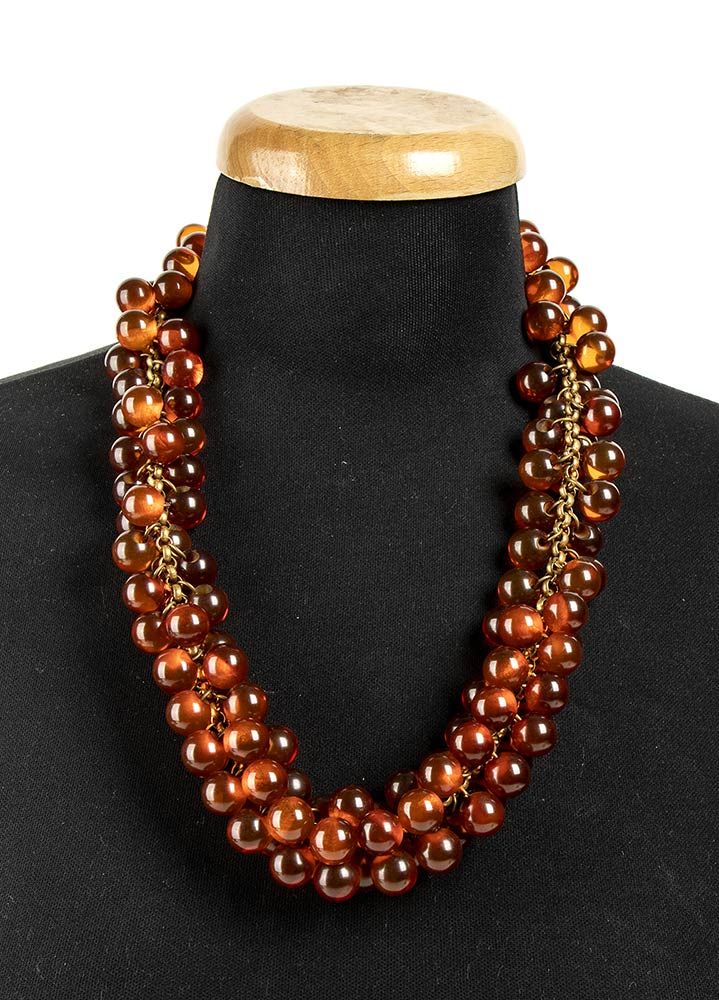 Null 米里亚姆-哈斯凯尔

电木石项链

40年代/50年代



琥珀色电木珠镀金金属项链



一般情况下评级为B