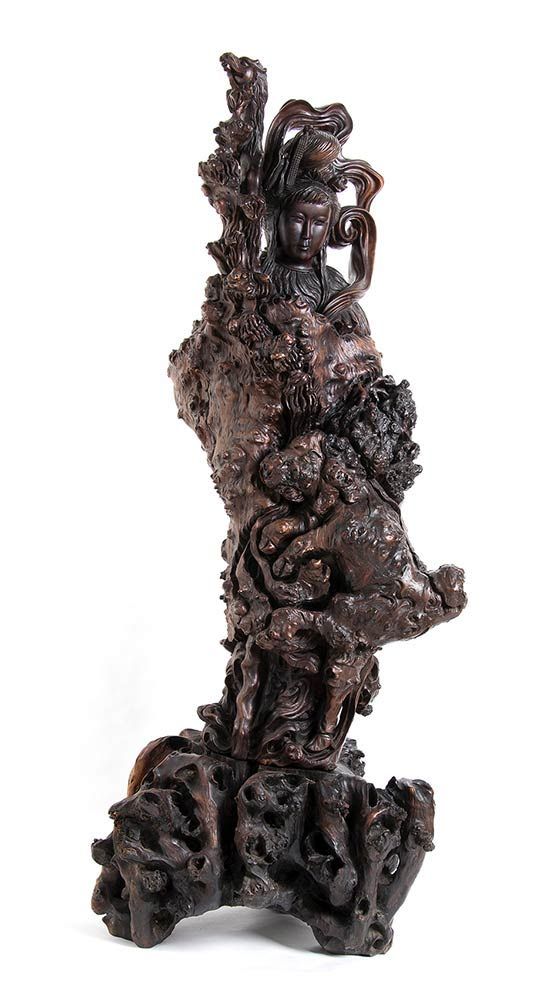 A LARGE ROOT CARVING OF A GUANYIN A LARGE ROOT CARVING OF A GUANYIN

China, late&hellip;
