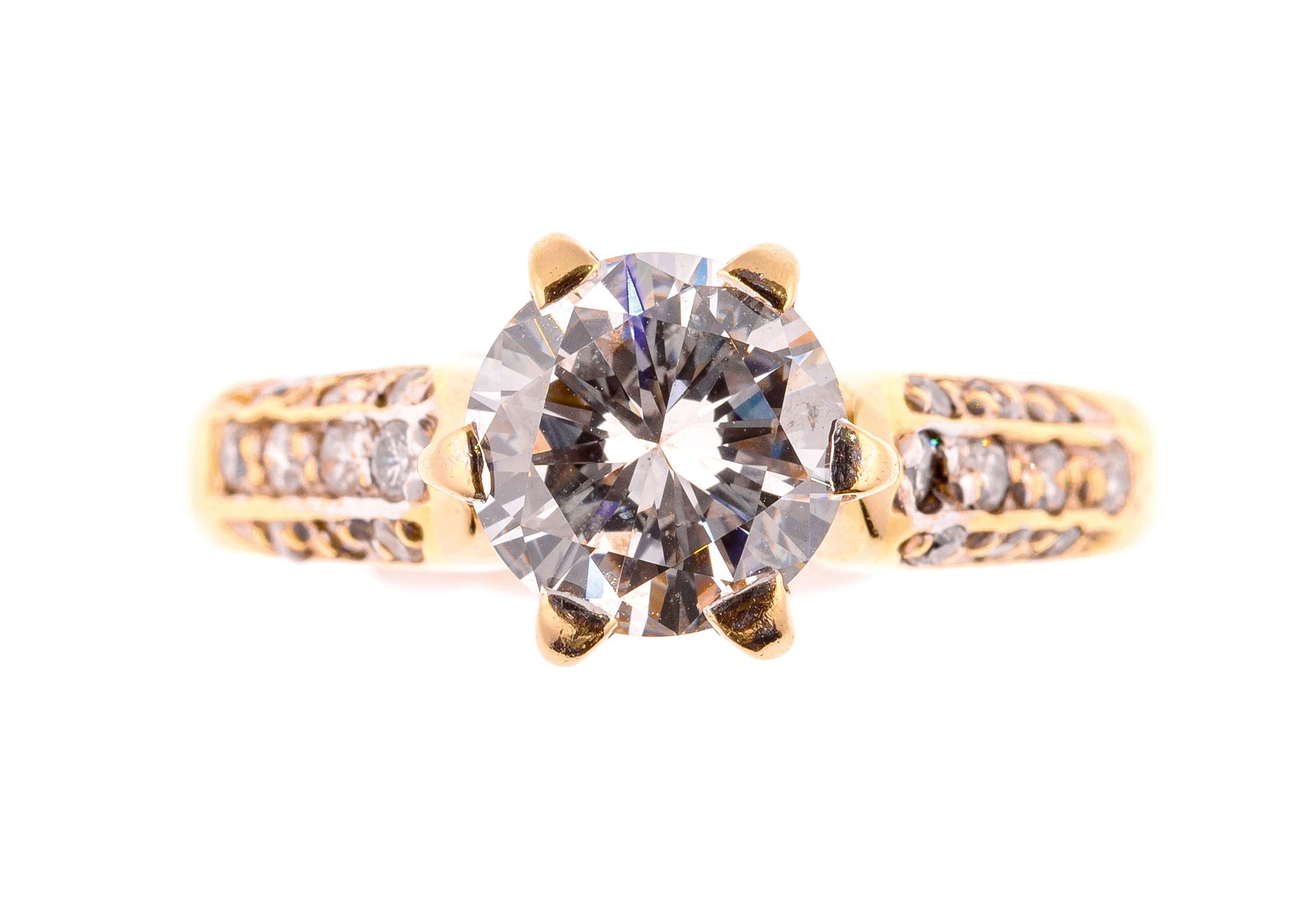 Null Gold solitaire centered on a high quality brilliant cut diamond of about 1.&hellip;