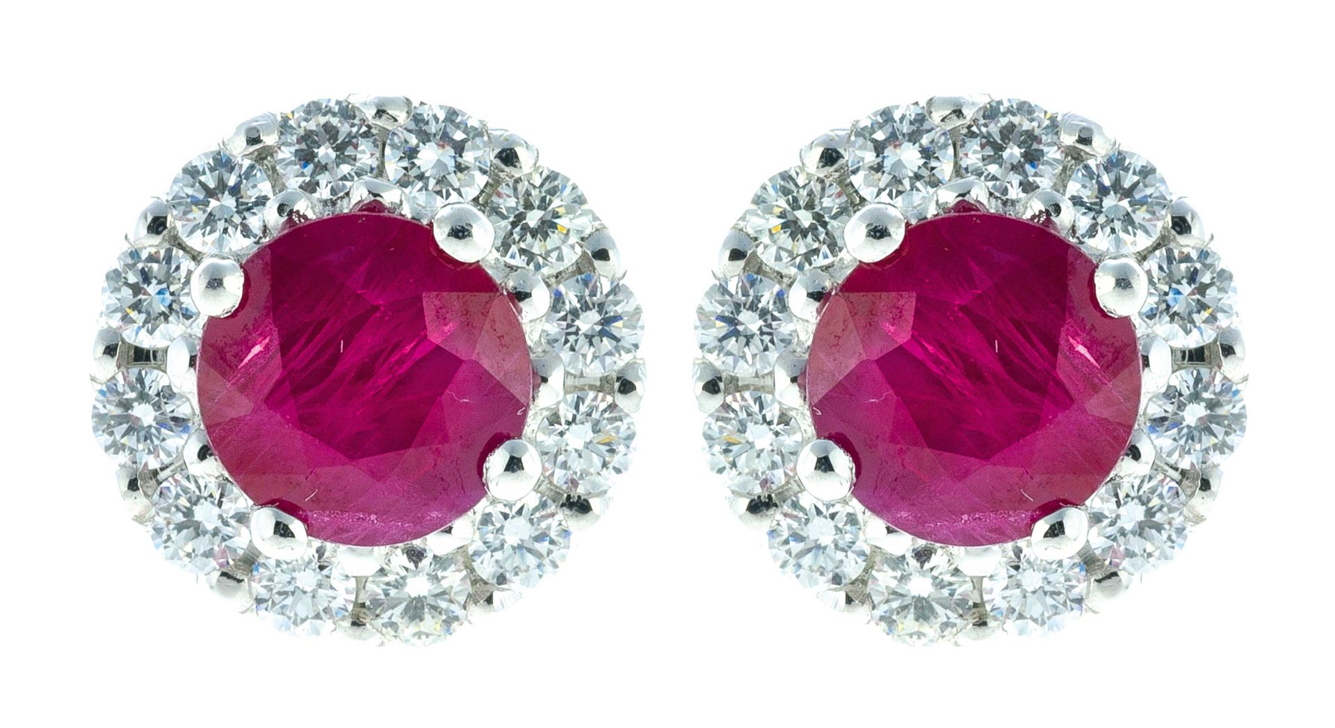 Null Pair of white gold earrings centered on two Burmese rubies calibrating 1.73&hellip;