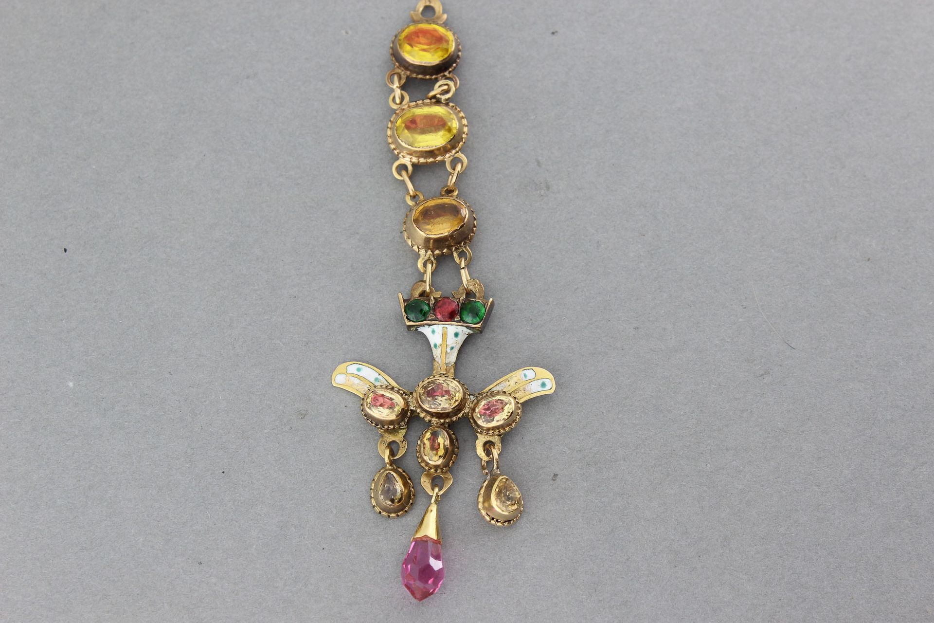 Null Enamelled gold Holy Spirit enriched with stones - Gross weight: 8.5 g