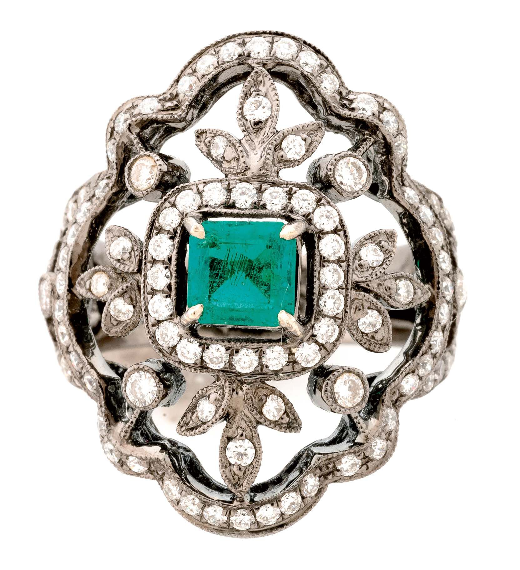 Null Blackened gold ring set with an emerald and diamonds - Gross weight: 9.8 g