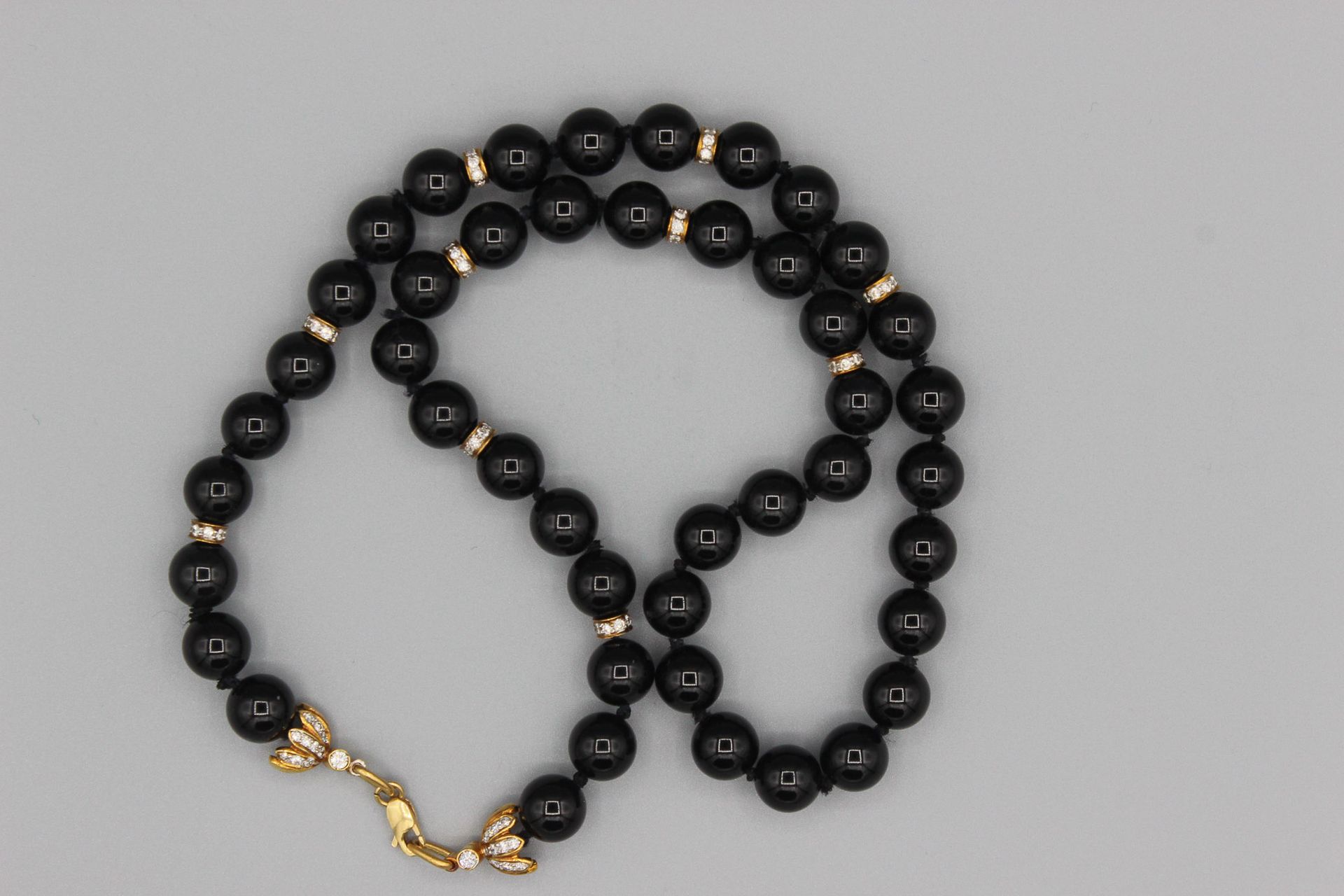 Null Onyx necklace, the ferrules set with brilliants