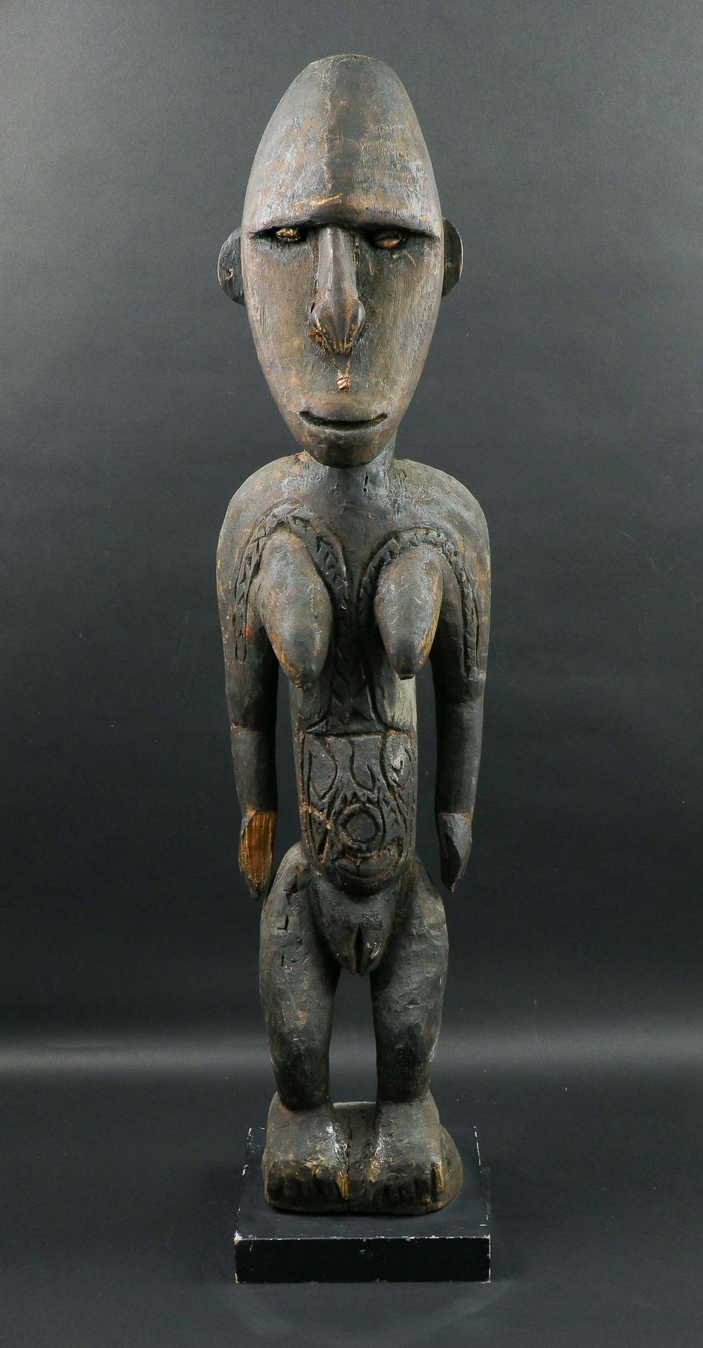 Null Ancestral wooden figure with old patina and marks of use. She is presented &hellip;