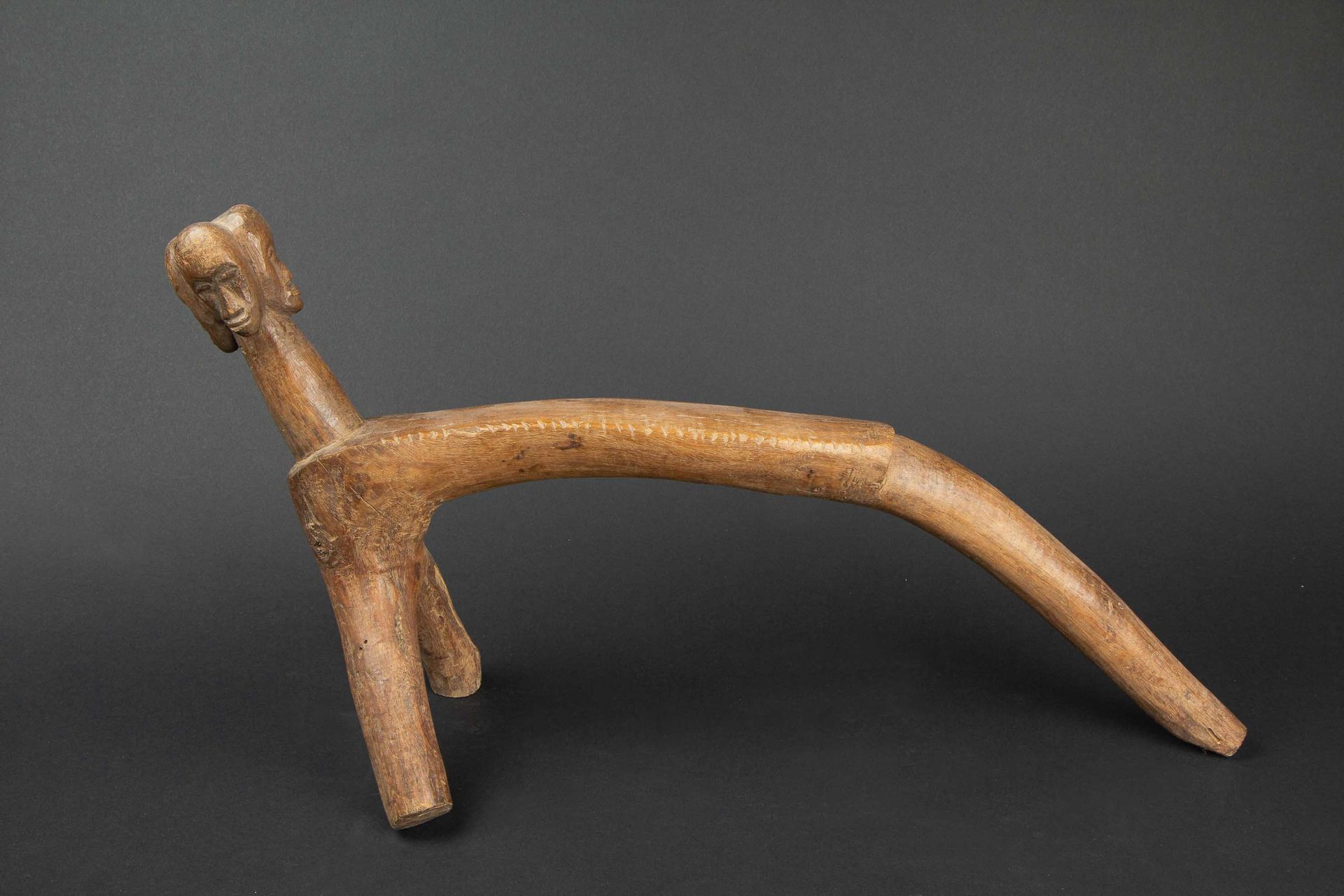 Null Tripod seat carved in the natural forms of the wood, with old patina of use&hellip;