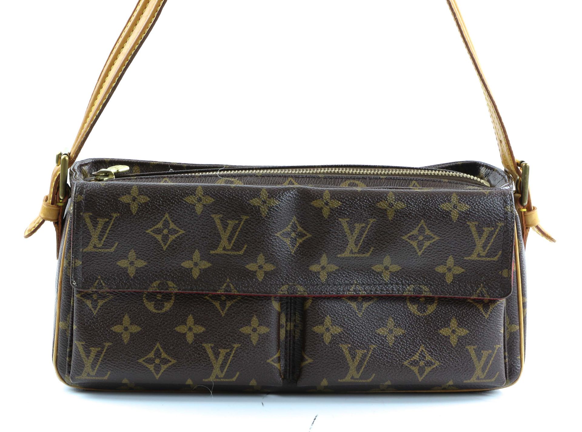 Louis VUITTON - Handle bag in monogrammed canvas and nat…