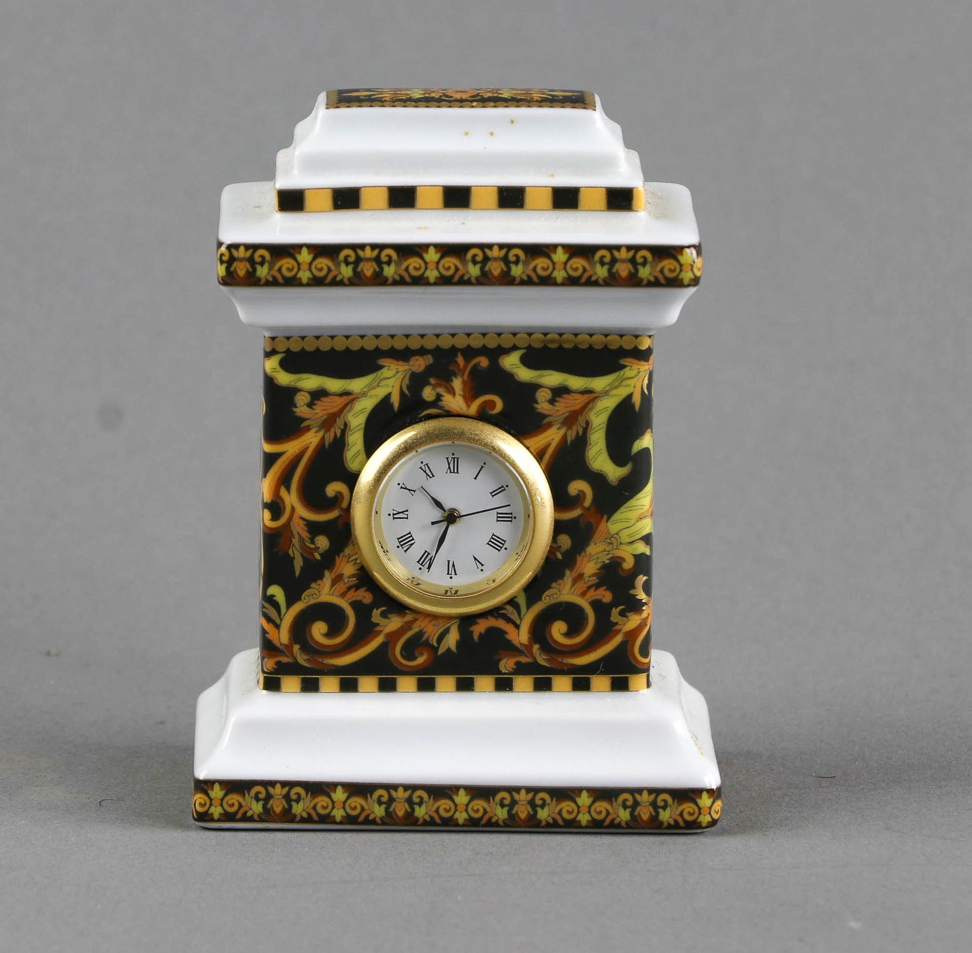 Null VERSACE - Polychrome porcelain clock - H : 8,5 cm - Lot sold by authority o&hellip;